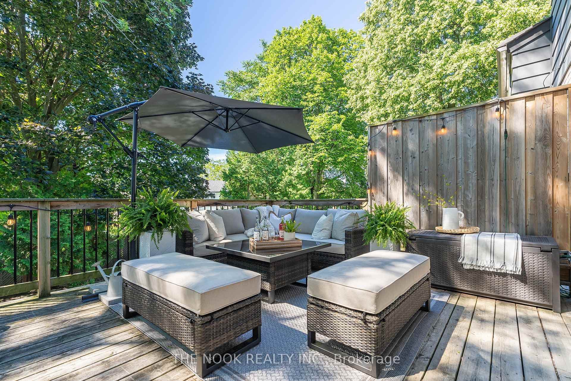 Step outside to the large deck w/privacy wall