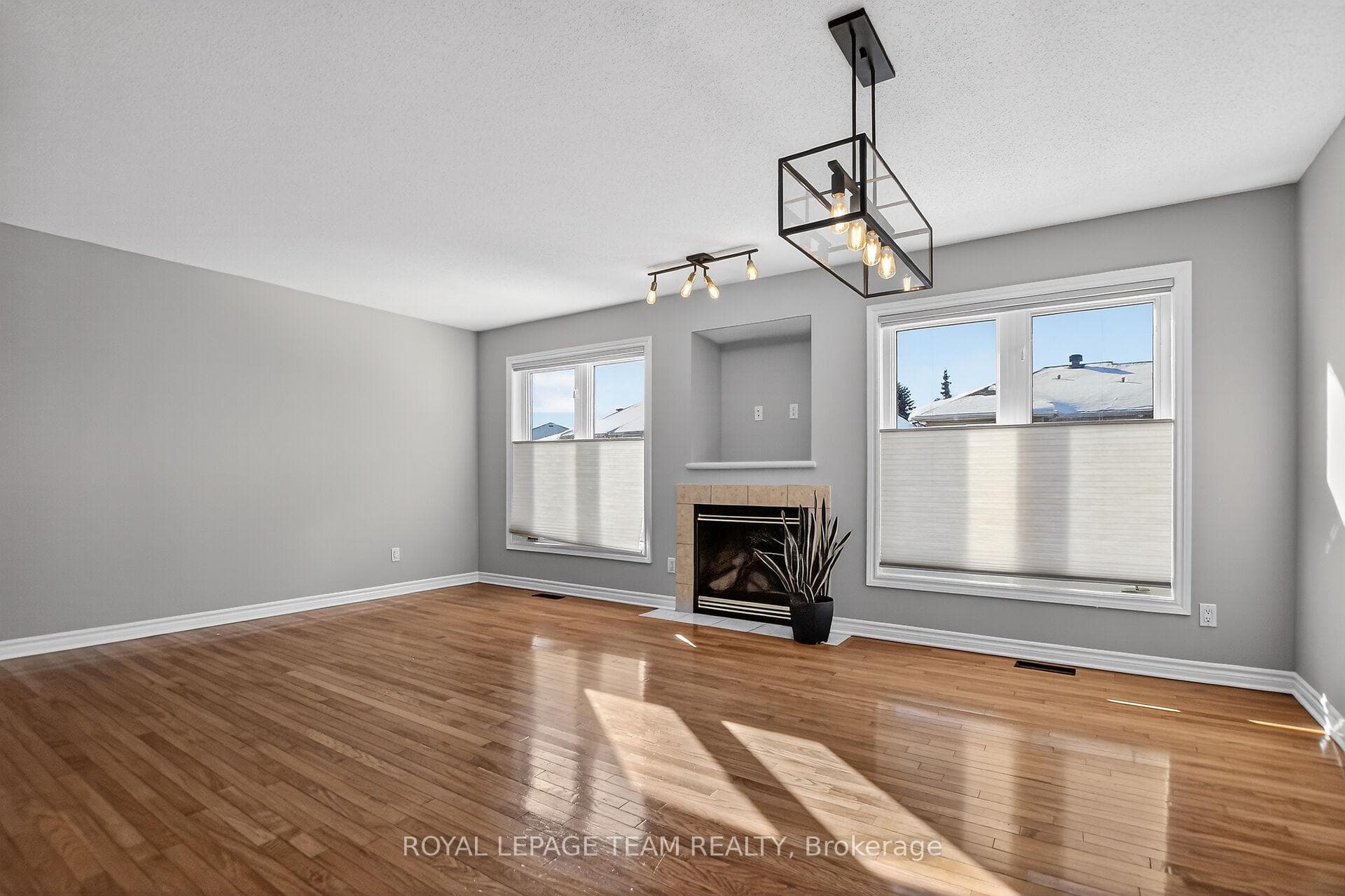 Gas fireplace in open concept Living/Dining area.