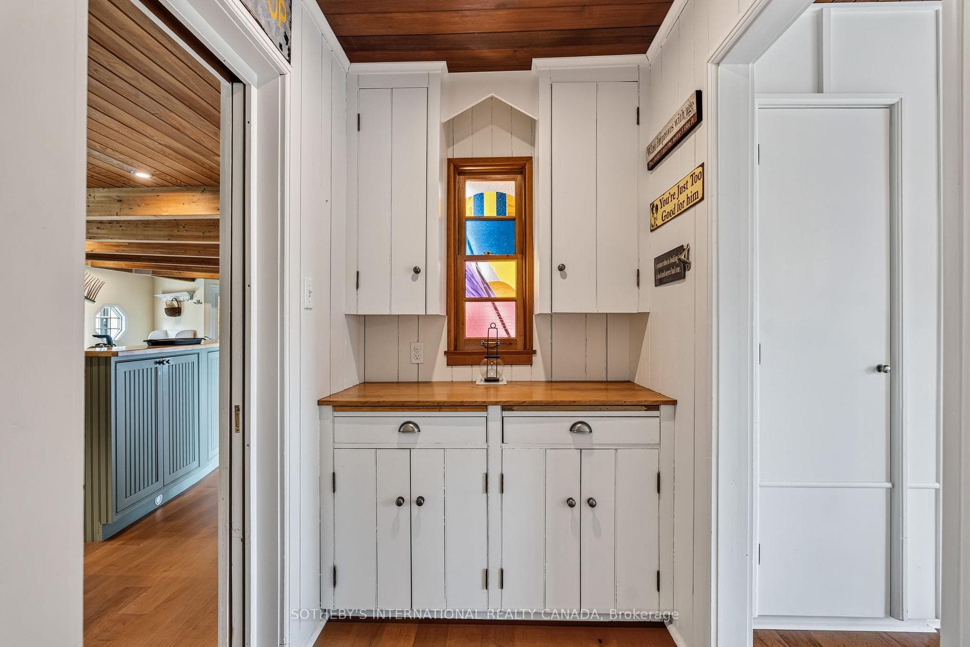 Servery between kitchen and dining room.