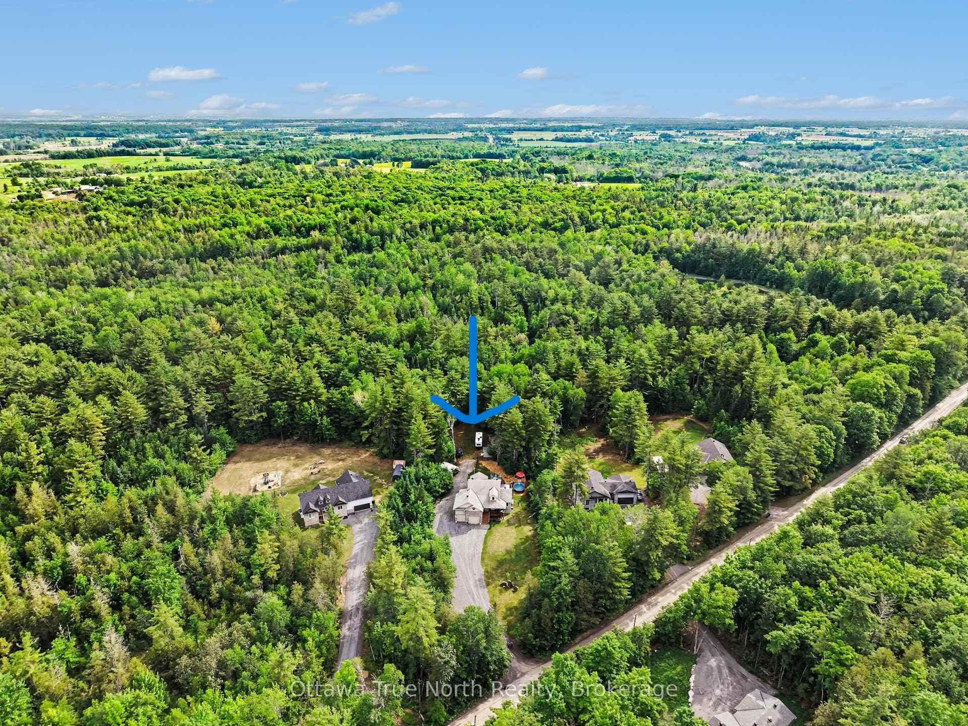Overhead shot with arrow showing house