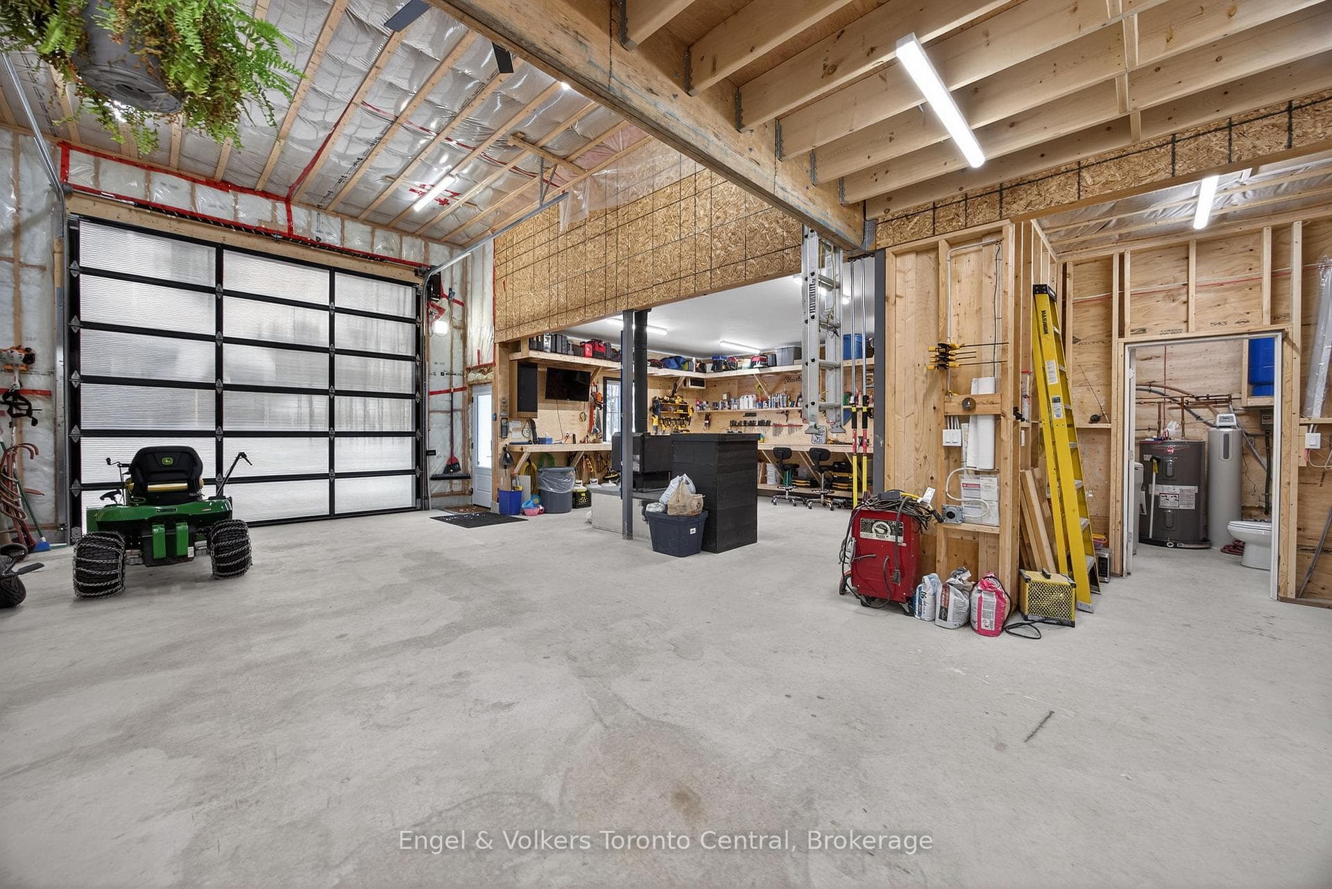 Workshop: heated floor, woodstove, washroom
