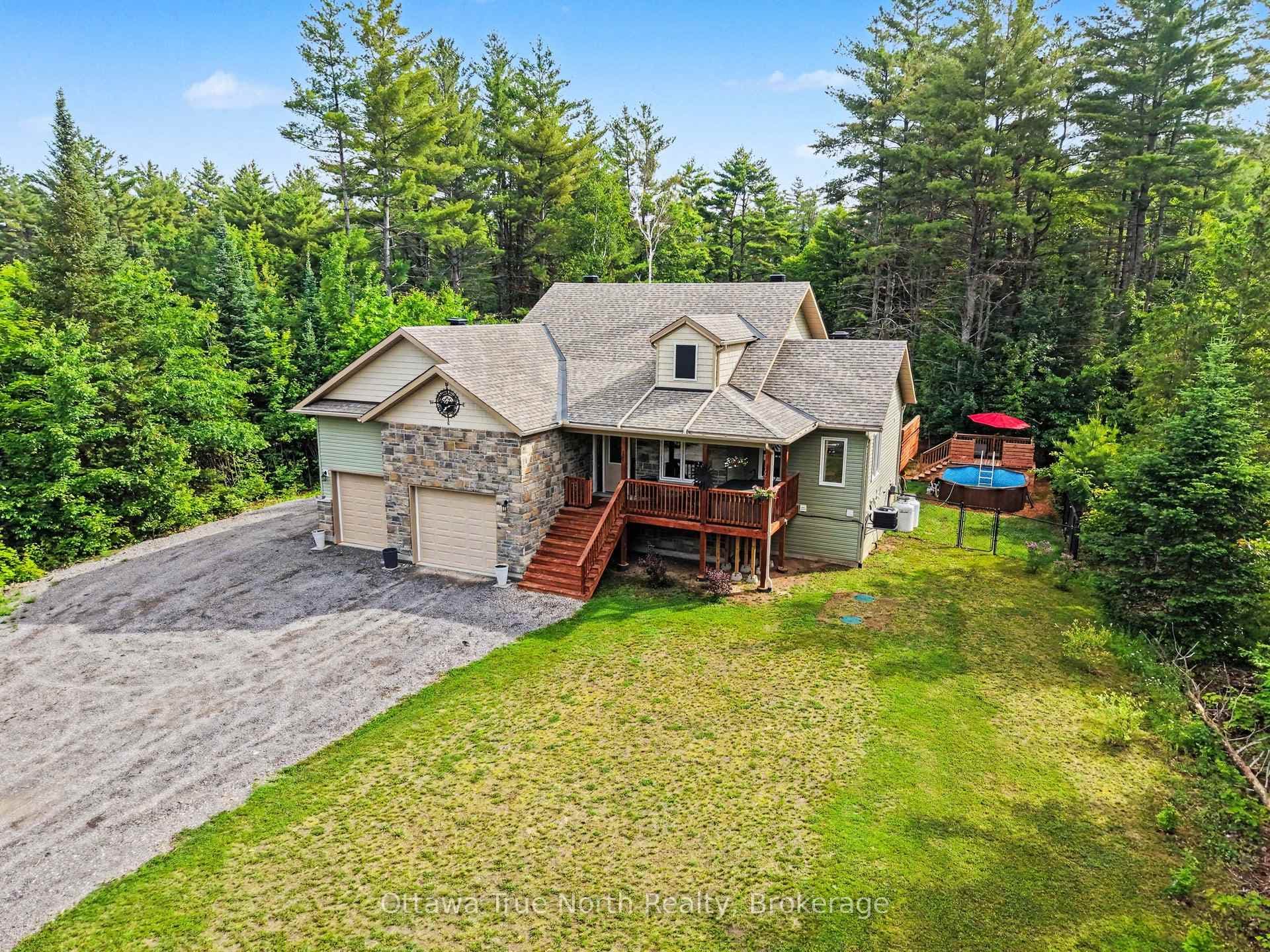 1196 Flat Rapids Road photo 3