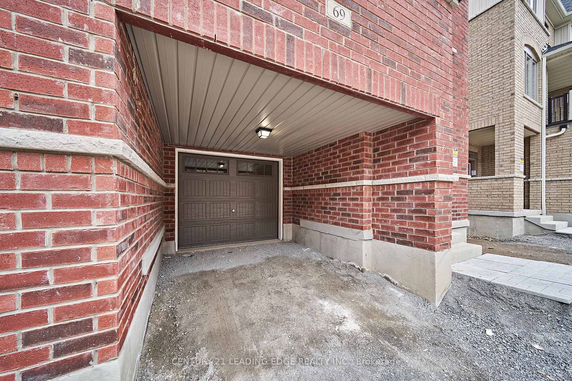 Covered Driveway & Garage Entrance