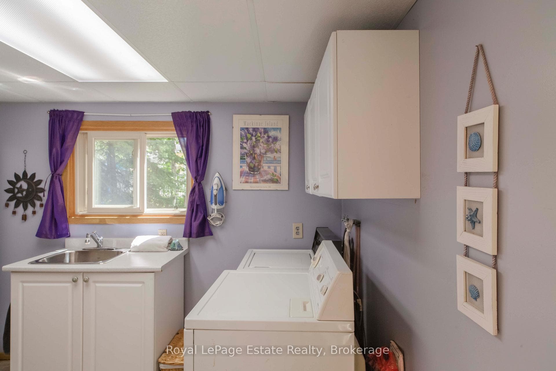 Laundry with 2 piece bathroom