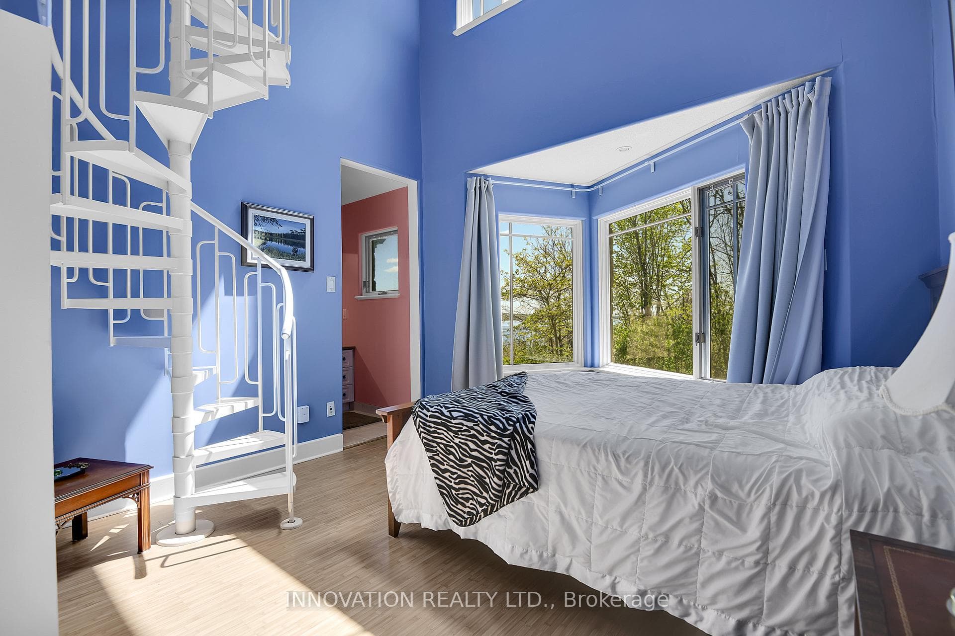 Bedroom 2 with stairs to loft area