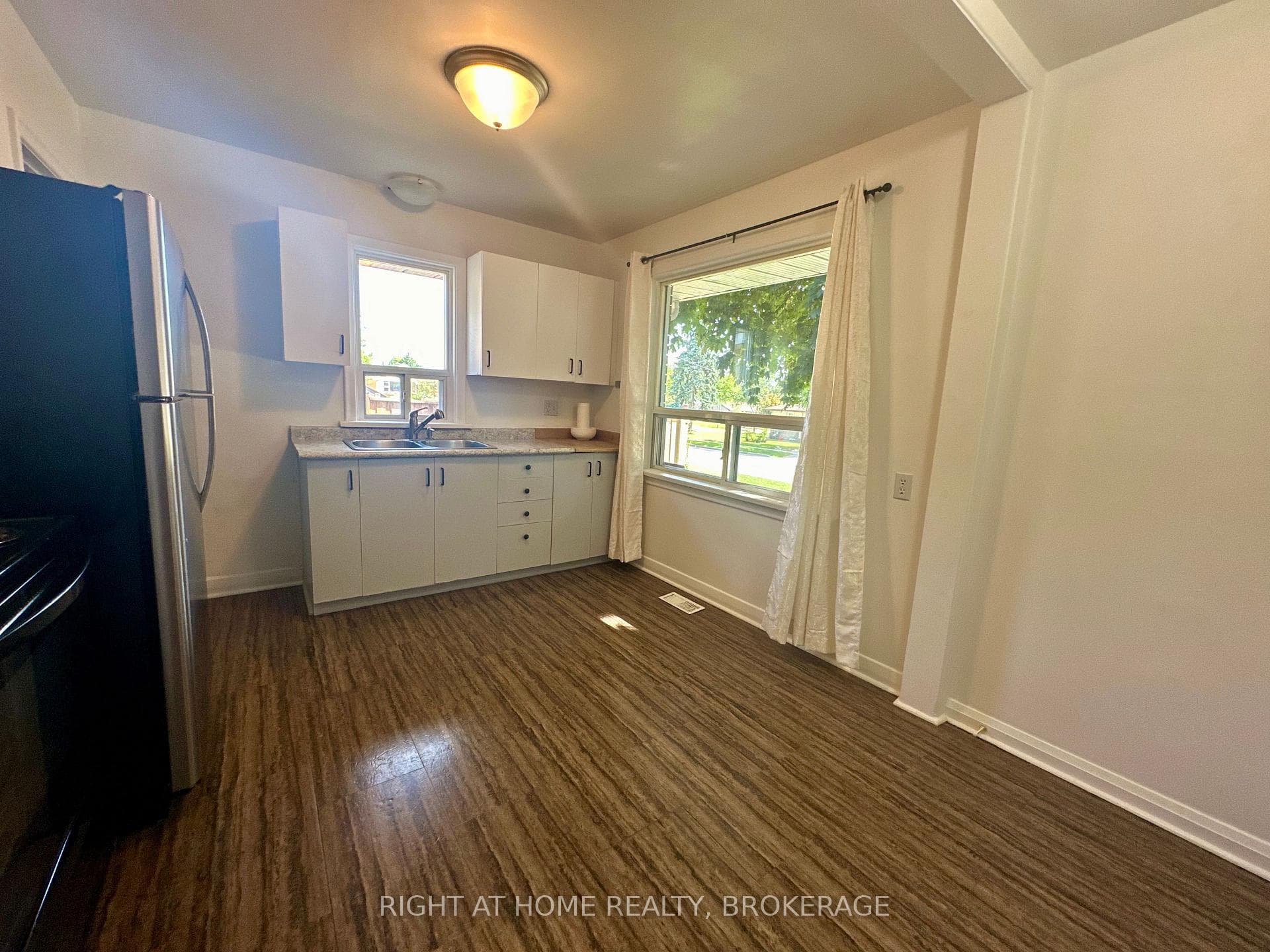 Main floor eat-in kitchen with double sink