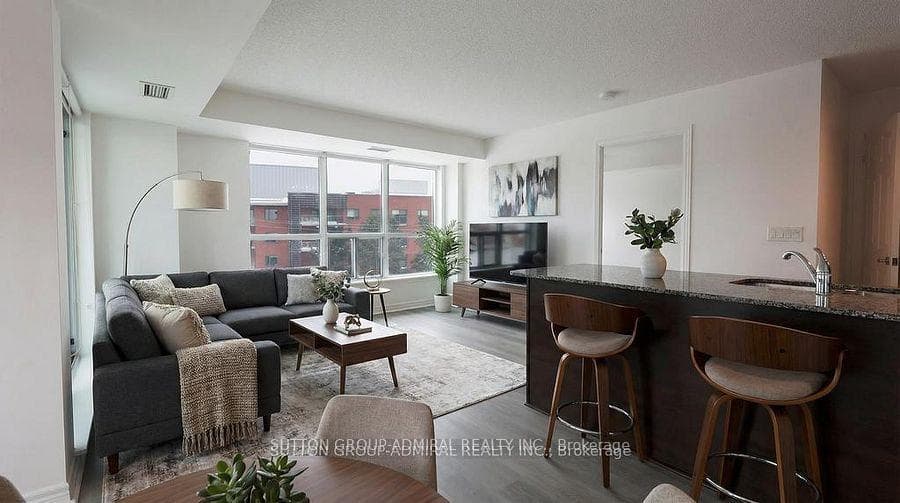 Virtually staged comfy living and dining area