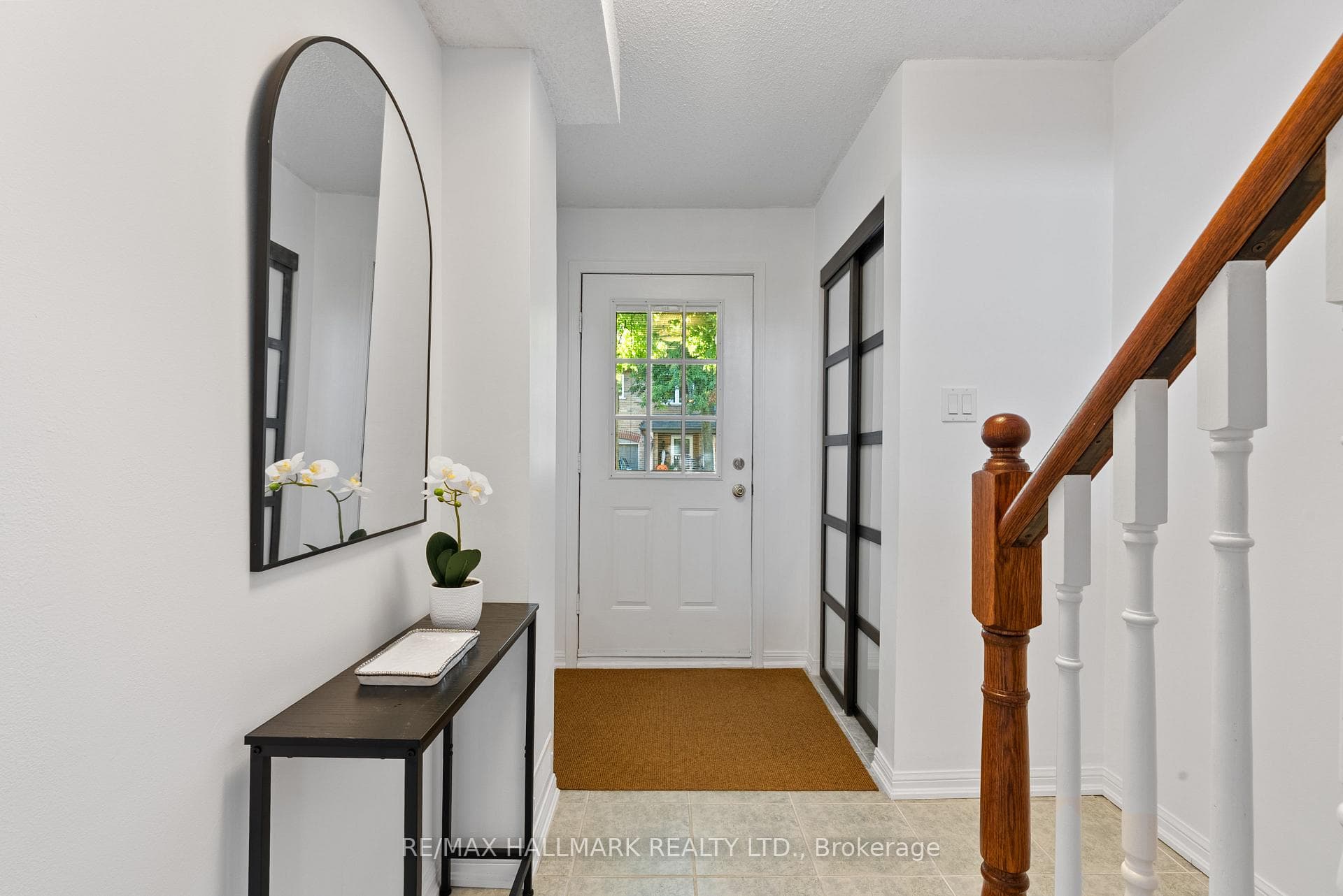 Bright Entrance with new closet doors