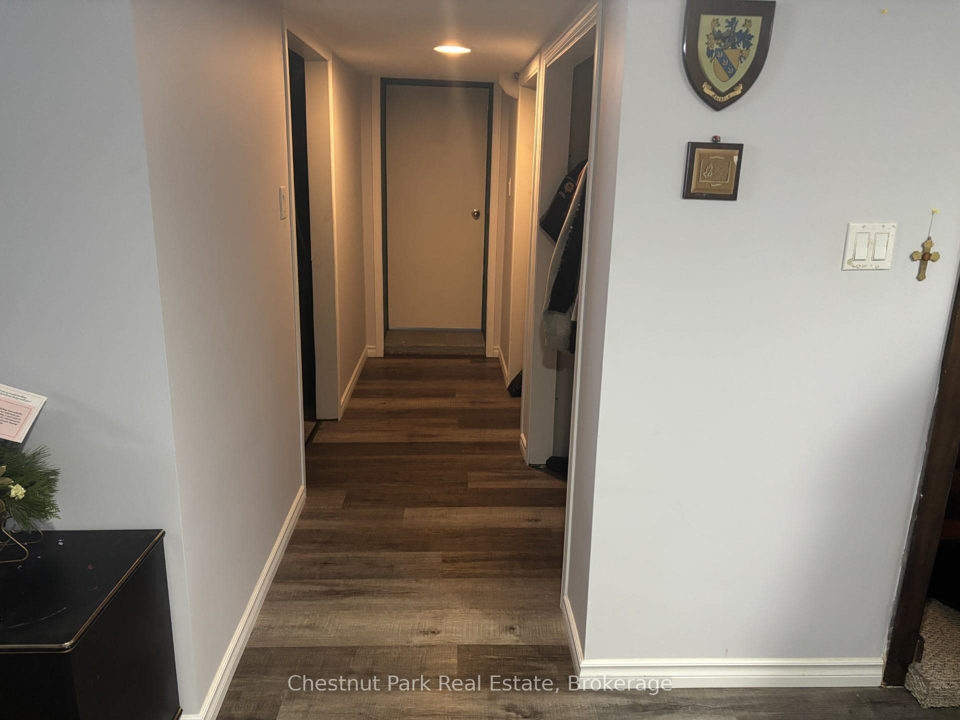 Lower level hallway to workshop and utility room