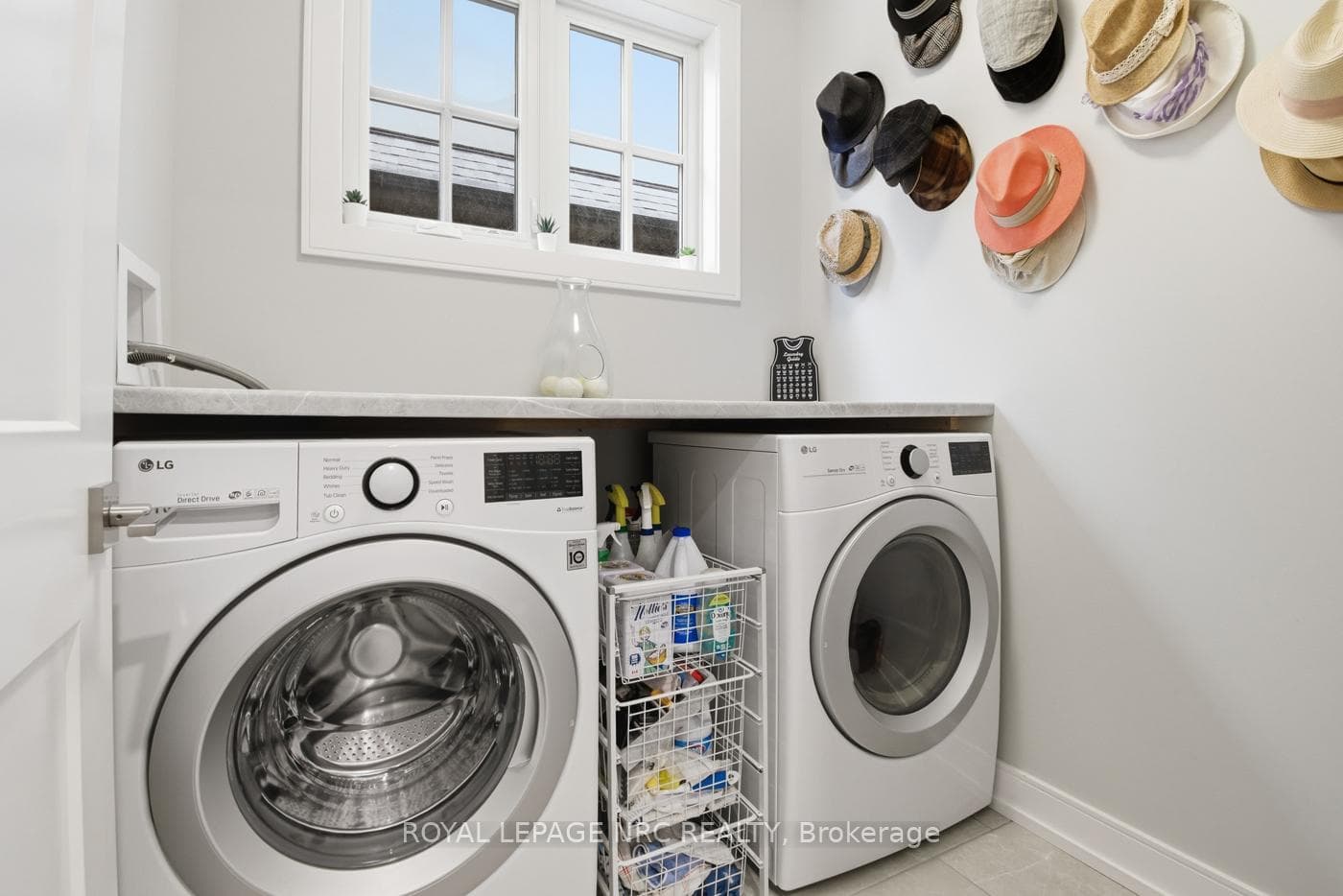 Main Floor Laundry with windows & folding counter