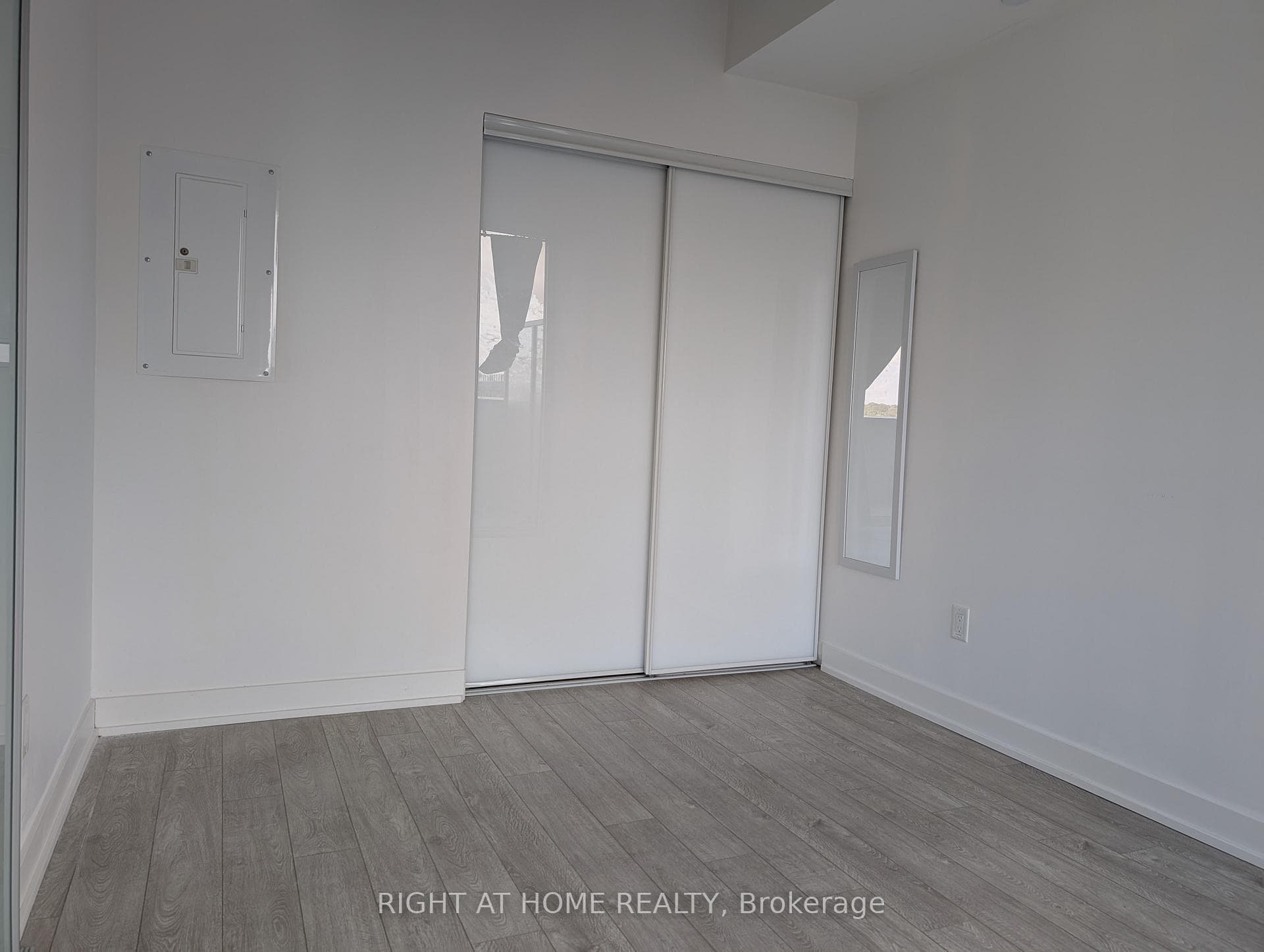 main bedroom with large windows for natural light