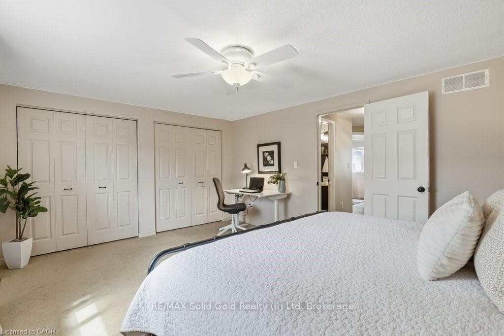 Large master bedroom with dual closets