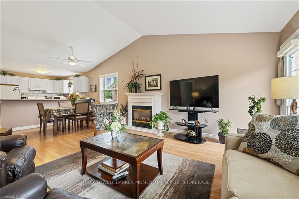 Comfortable living room with view of backyard