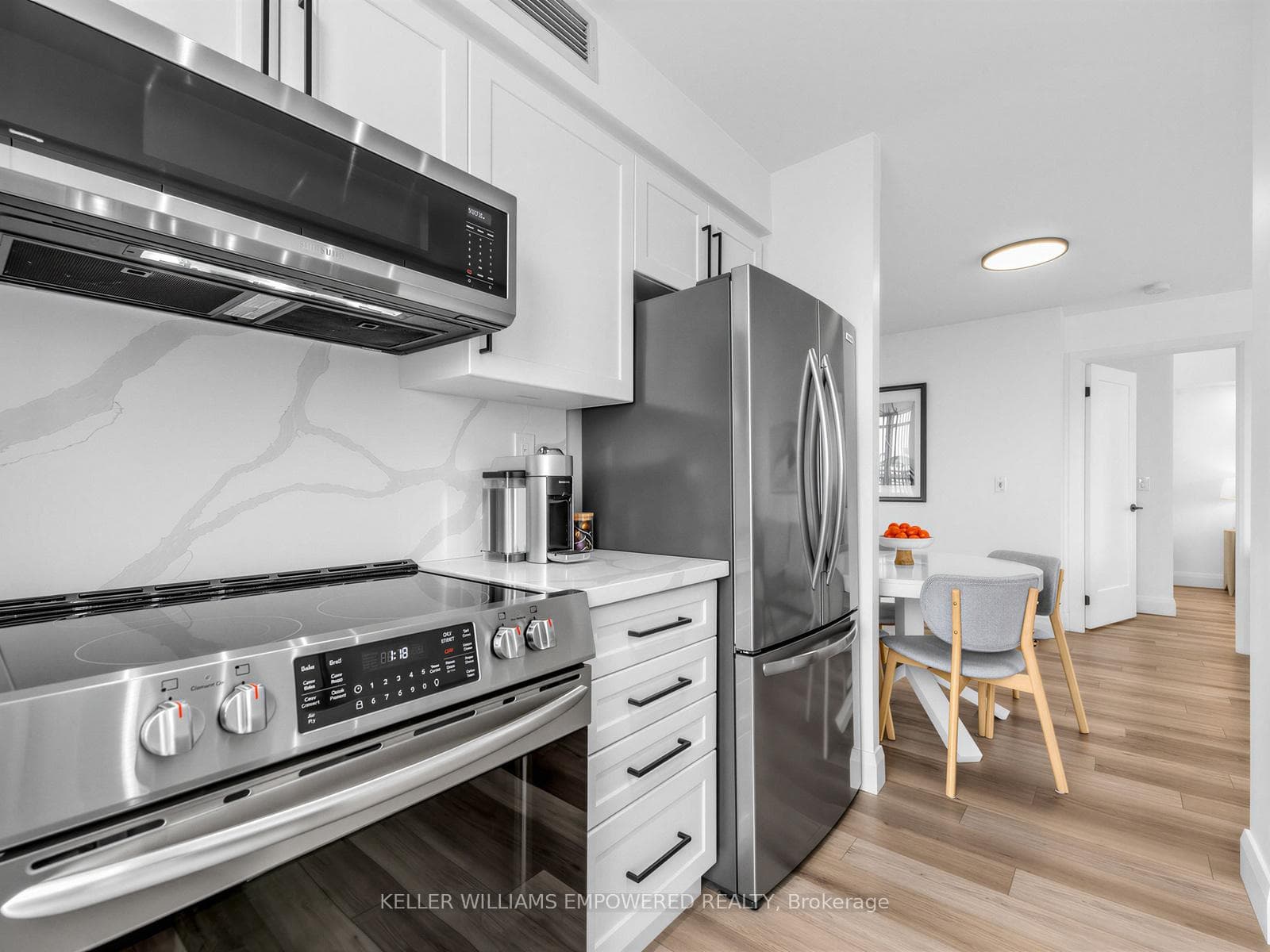 Gorgeous Quartz Counters & Waterfall Backsplash