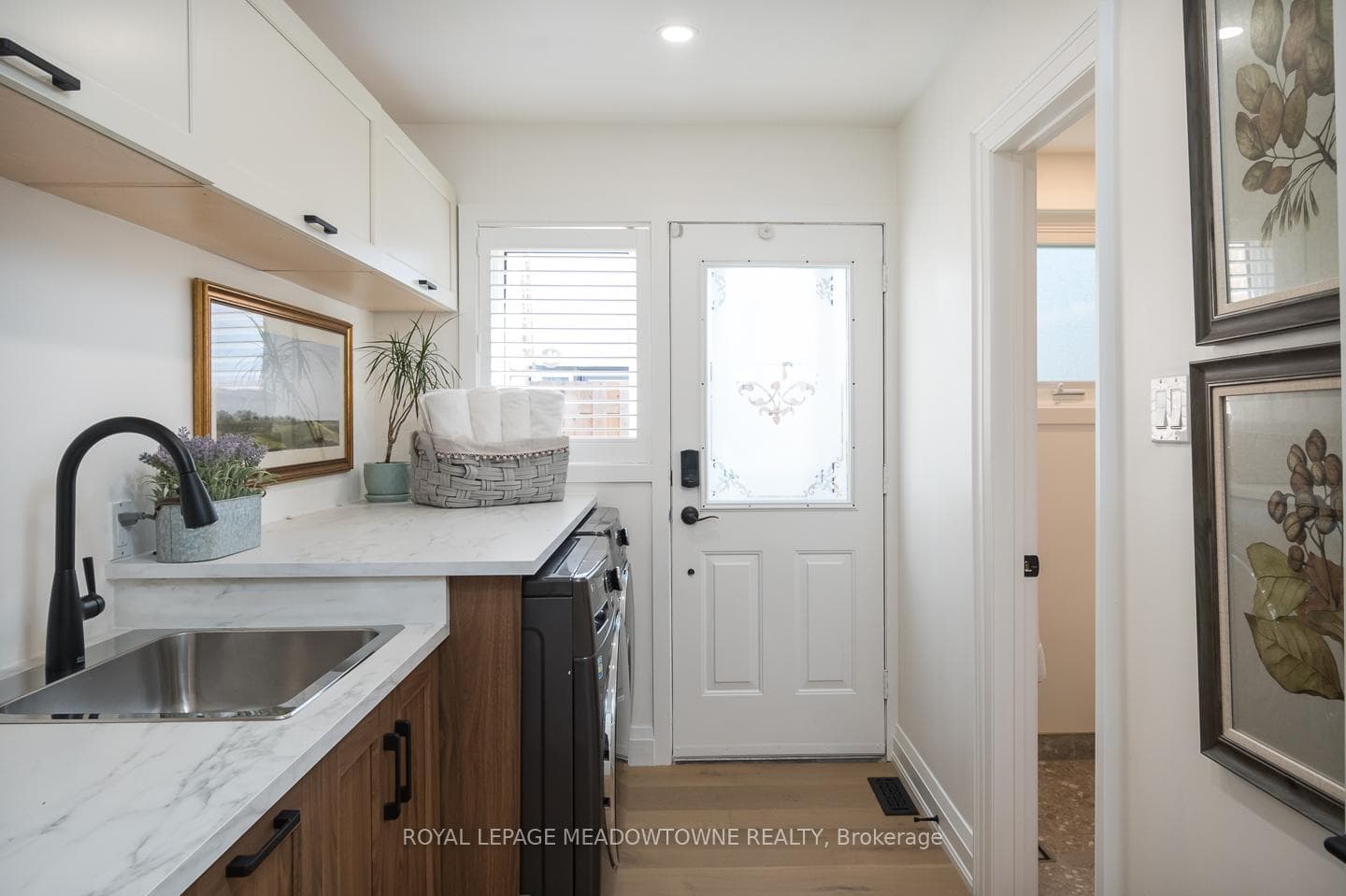 exterior side entrance with adjoining bathroom