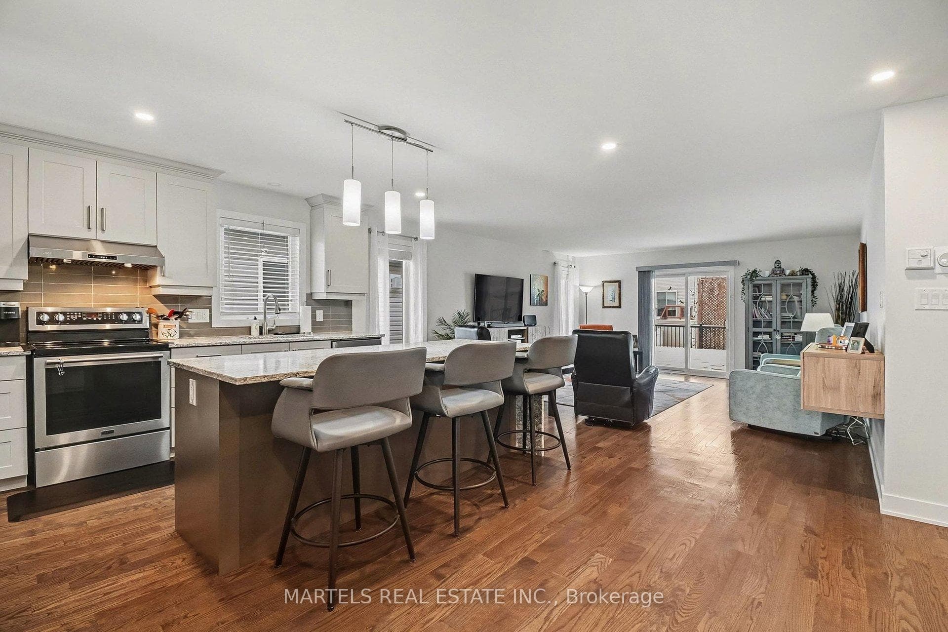 Gourmet kitchen w/high end appl's, stone & more
