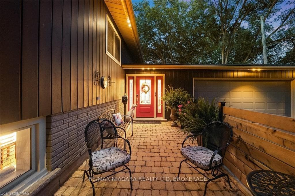 Entrance to property featuring a garage