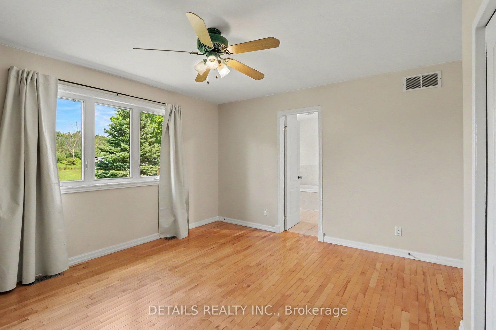 Primary bedroom with cheater to bath