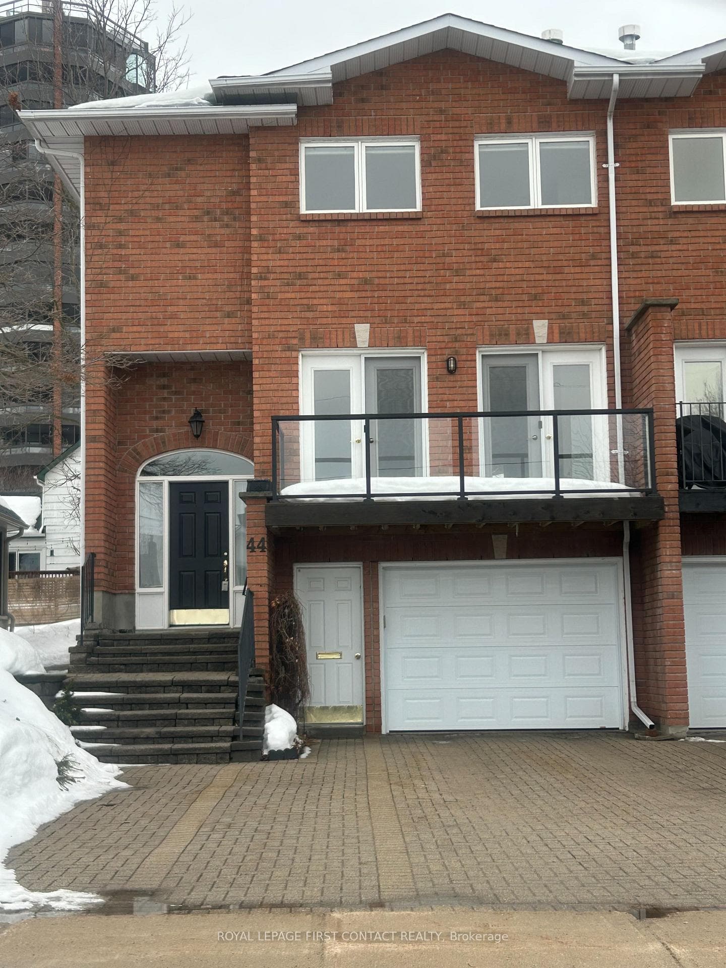 Front view showing new front balcony.