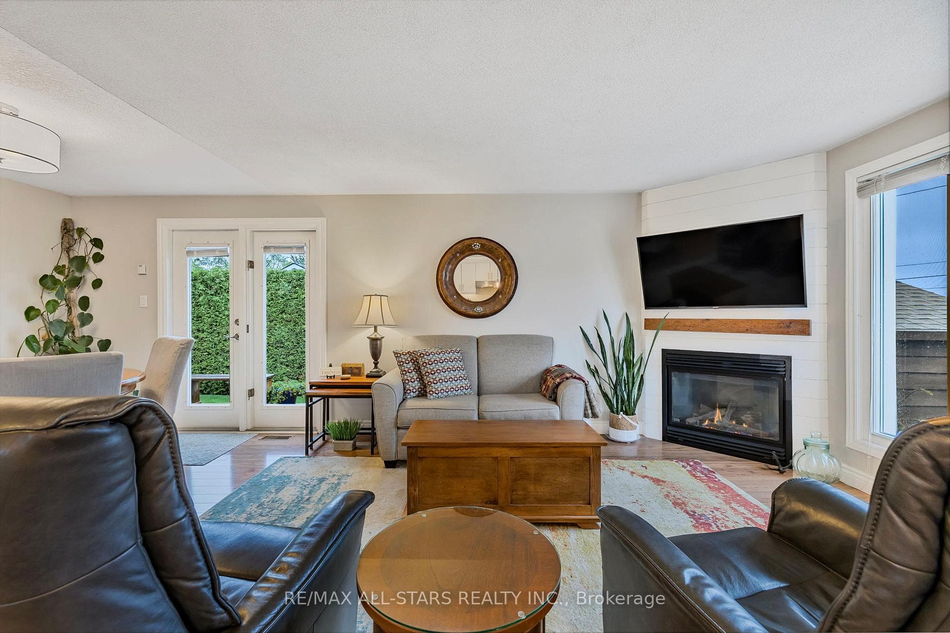 Main level Living w/ gas fireplace & large window
