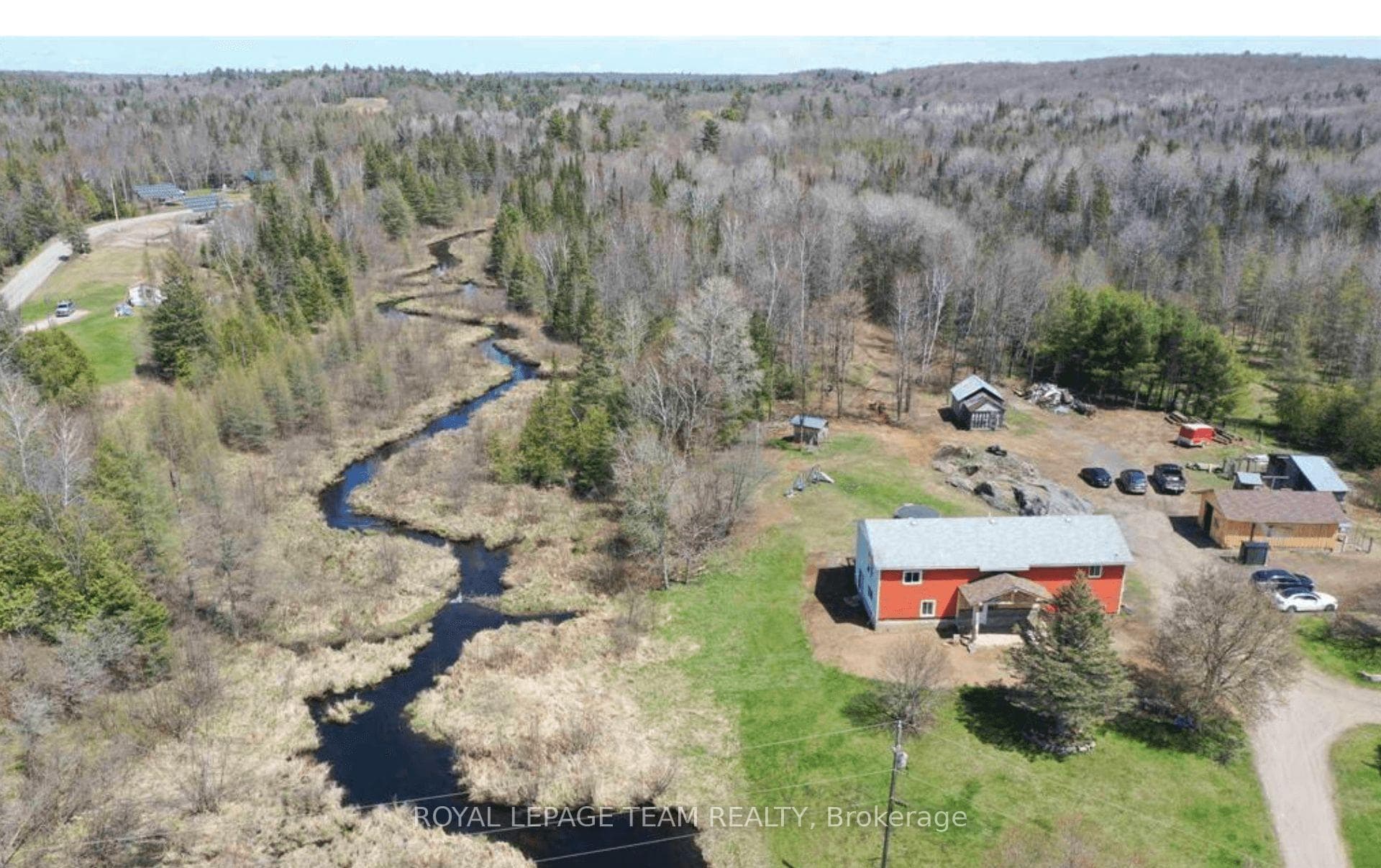 A gentle creek flowing alongside the property