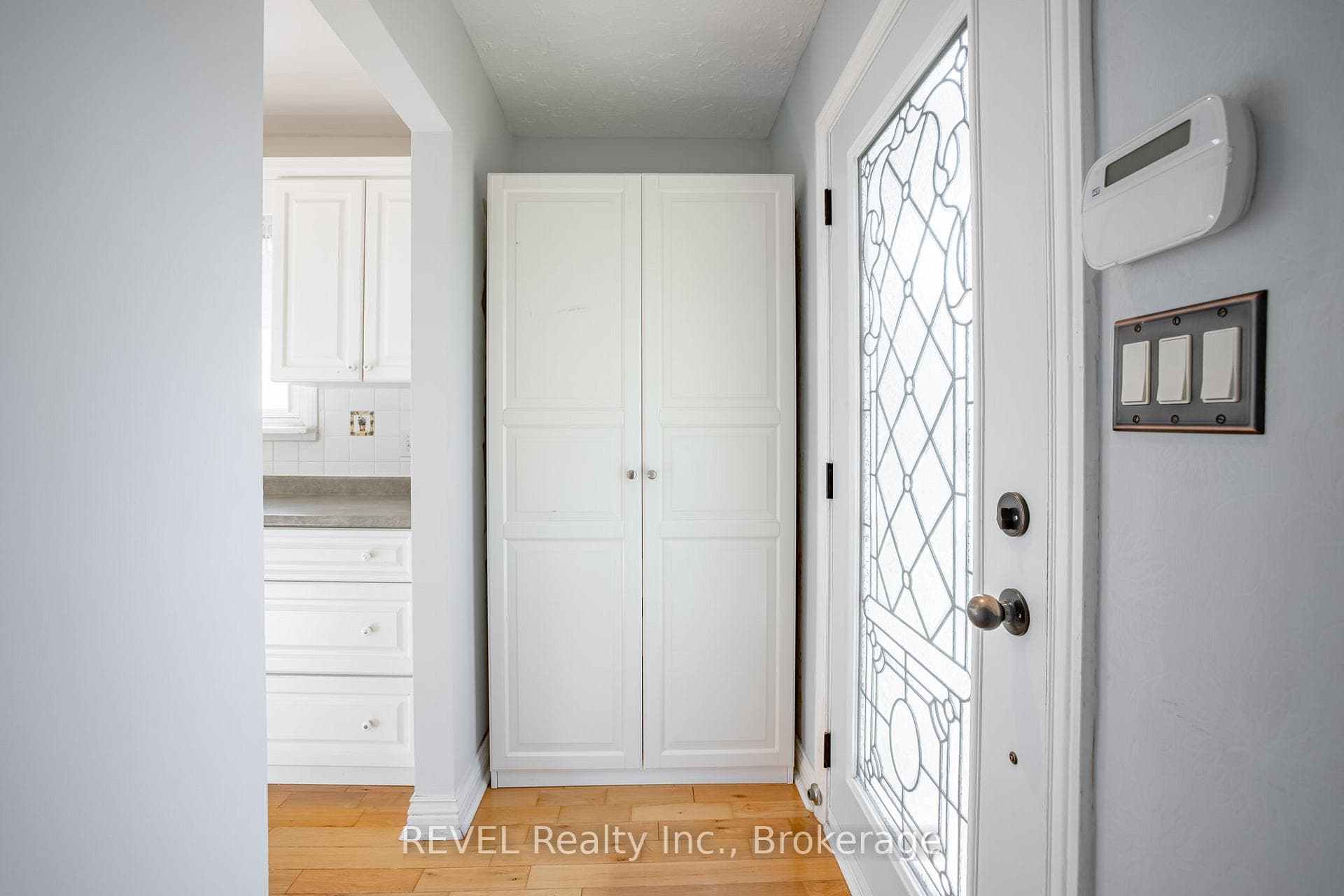 Foyer with closet & custom storage (included)