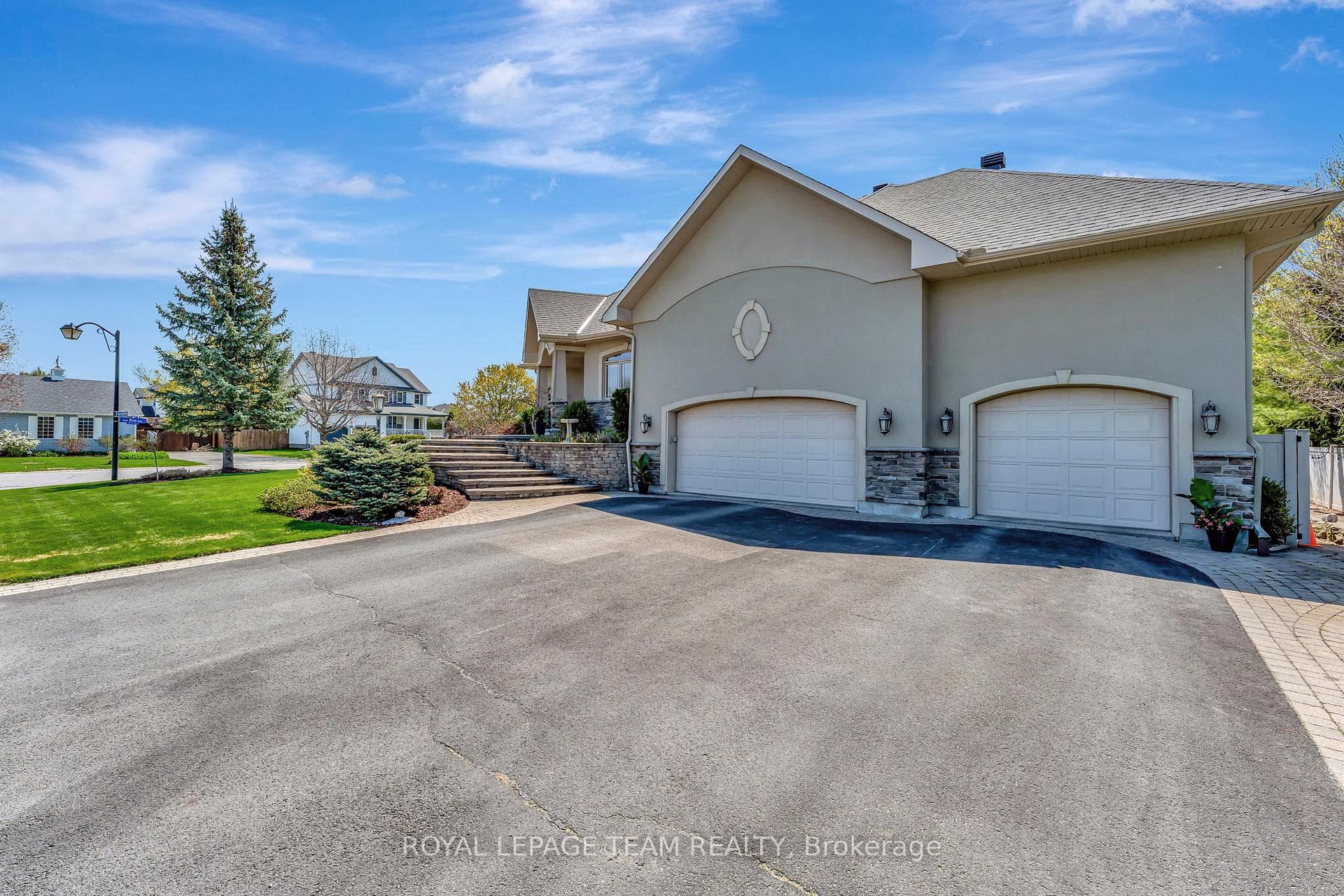 3 car garage with entry to both levels