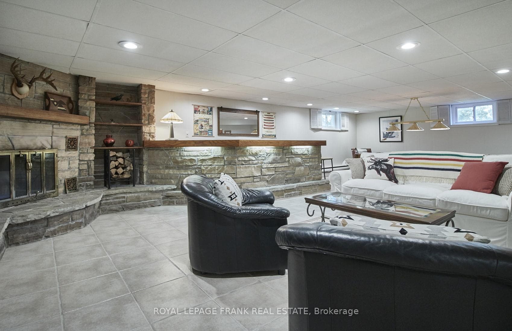 Stone bar and wood burning fireplace