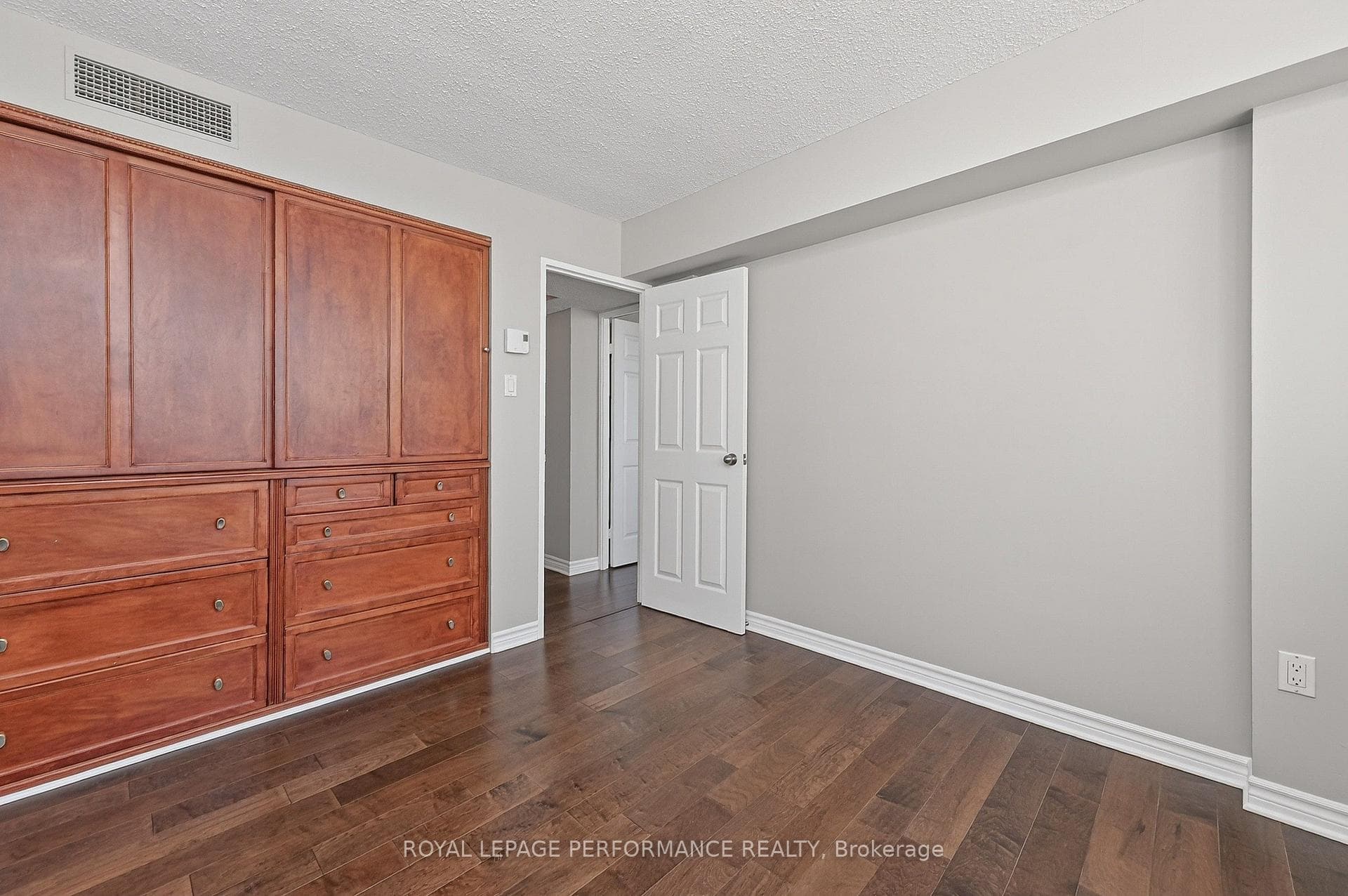 Second bedroom with built-in cabinets
