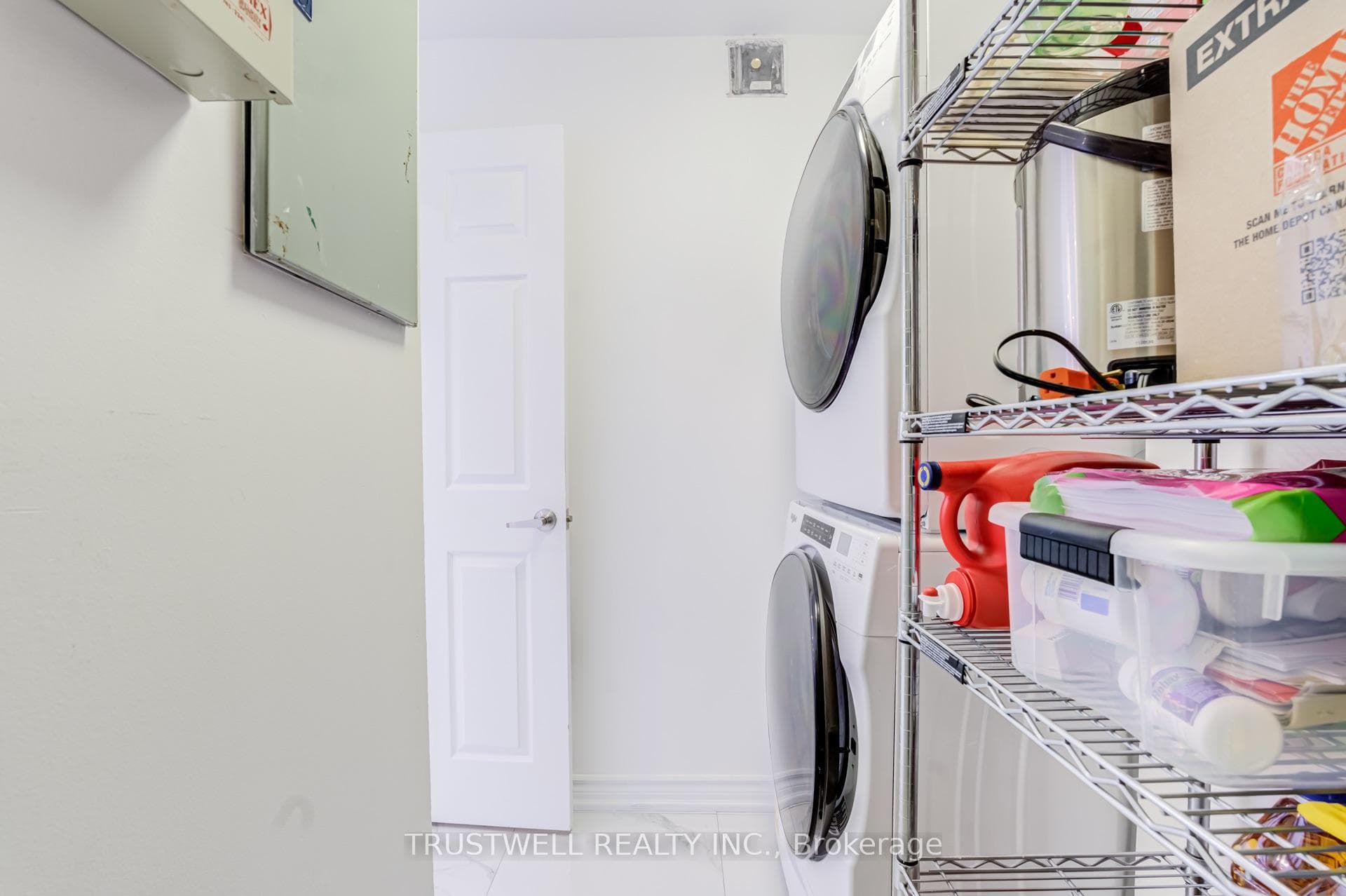 Laundry Room with Oversized Stacks Washer & Dryer