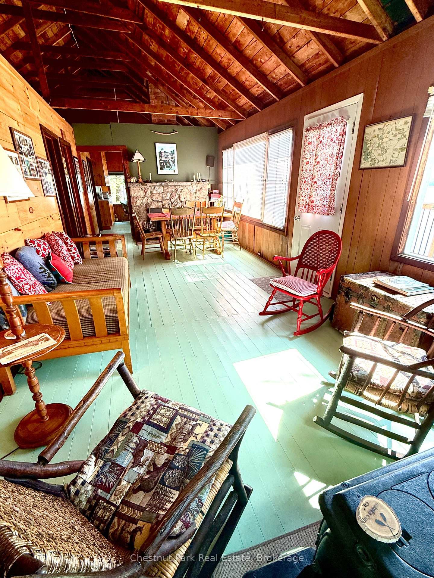 The main room has wooden vaulted ceiling