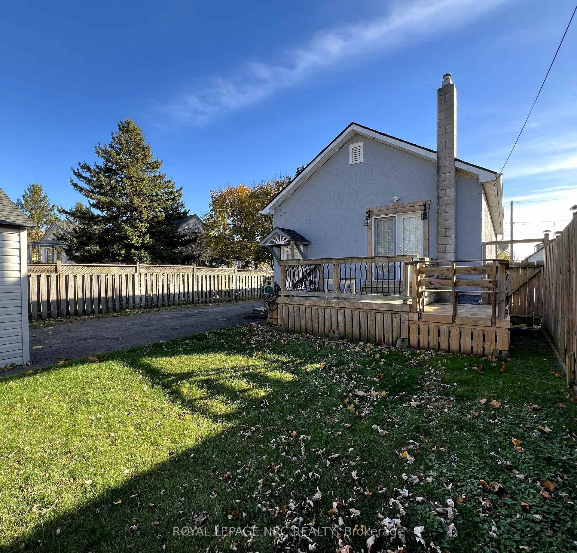 mostly fenced private rear yard