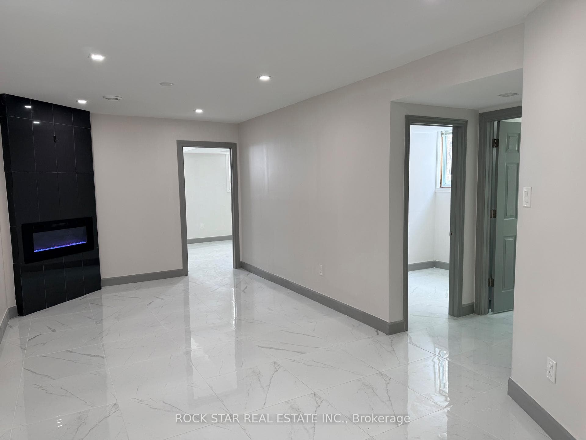 Basement with electric fireplace
