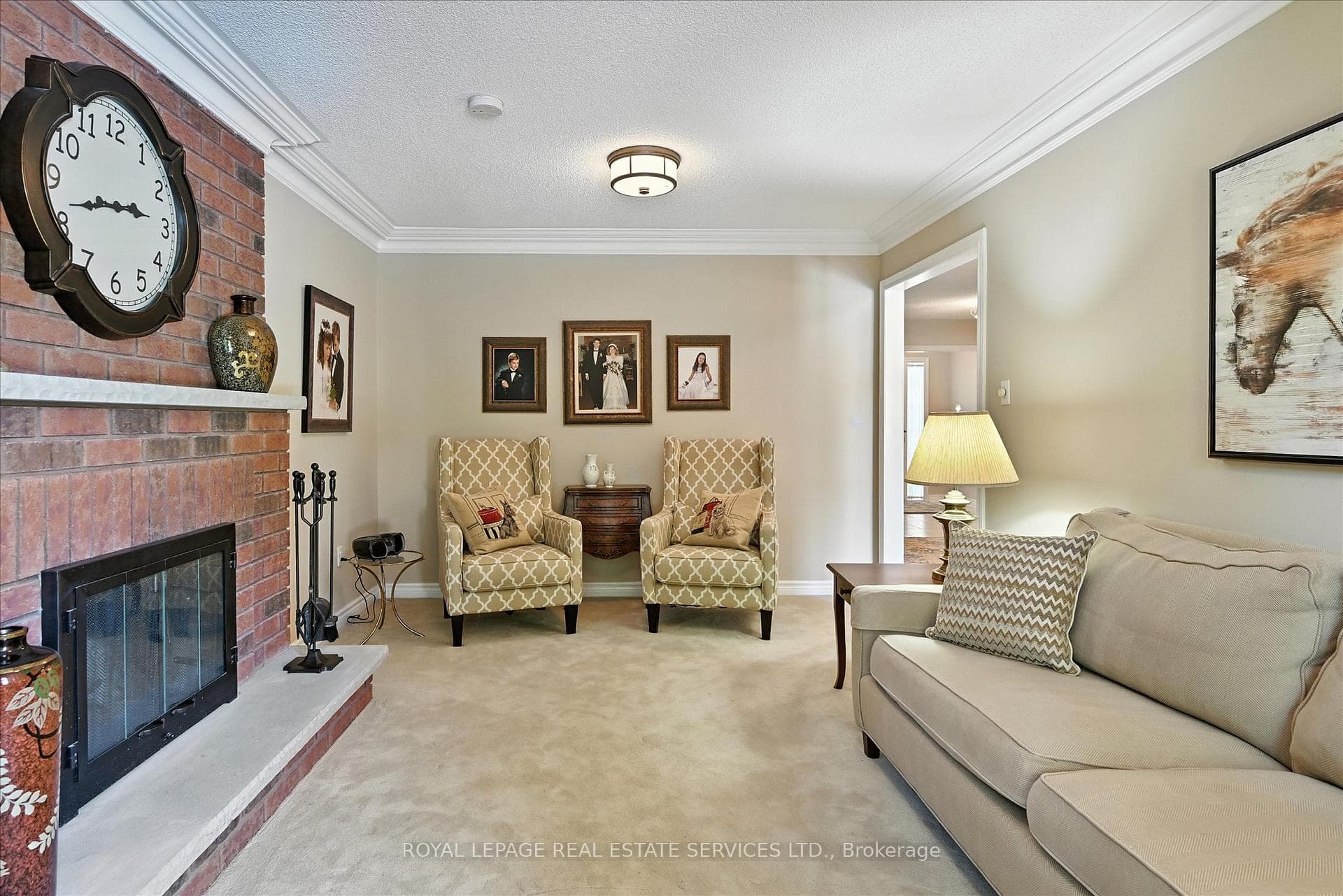 Family Room w/Classic Brick Woodburning Fireplace