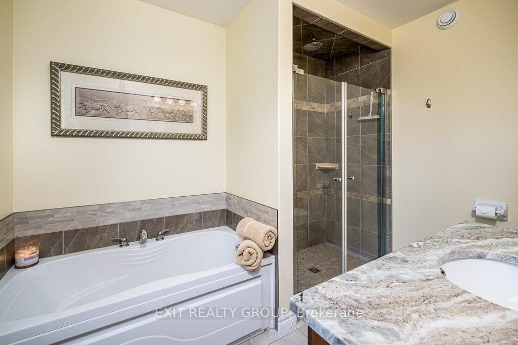 Primary Ensuite Bathroom. Separate soaker tub.