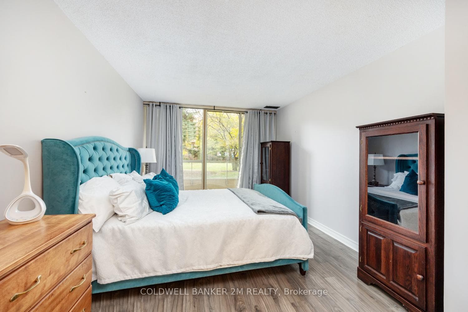 Primary Bedroom with Walkout to Balcony