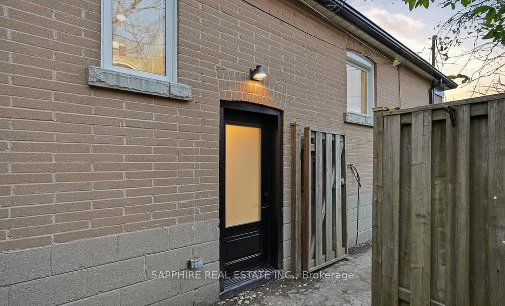 Entry to legal basement apartment from side