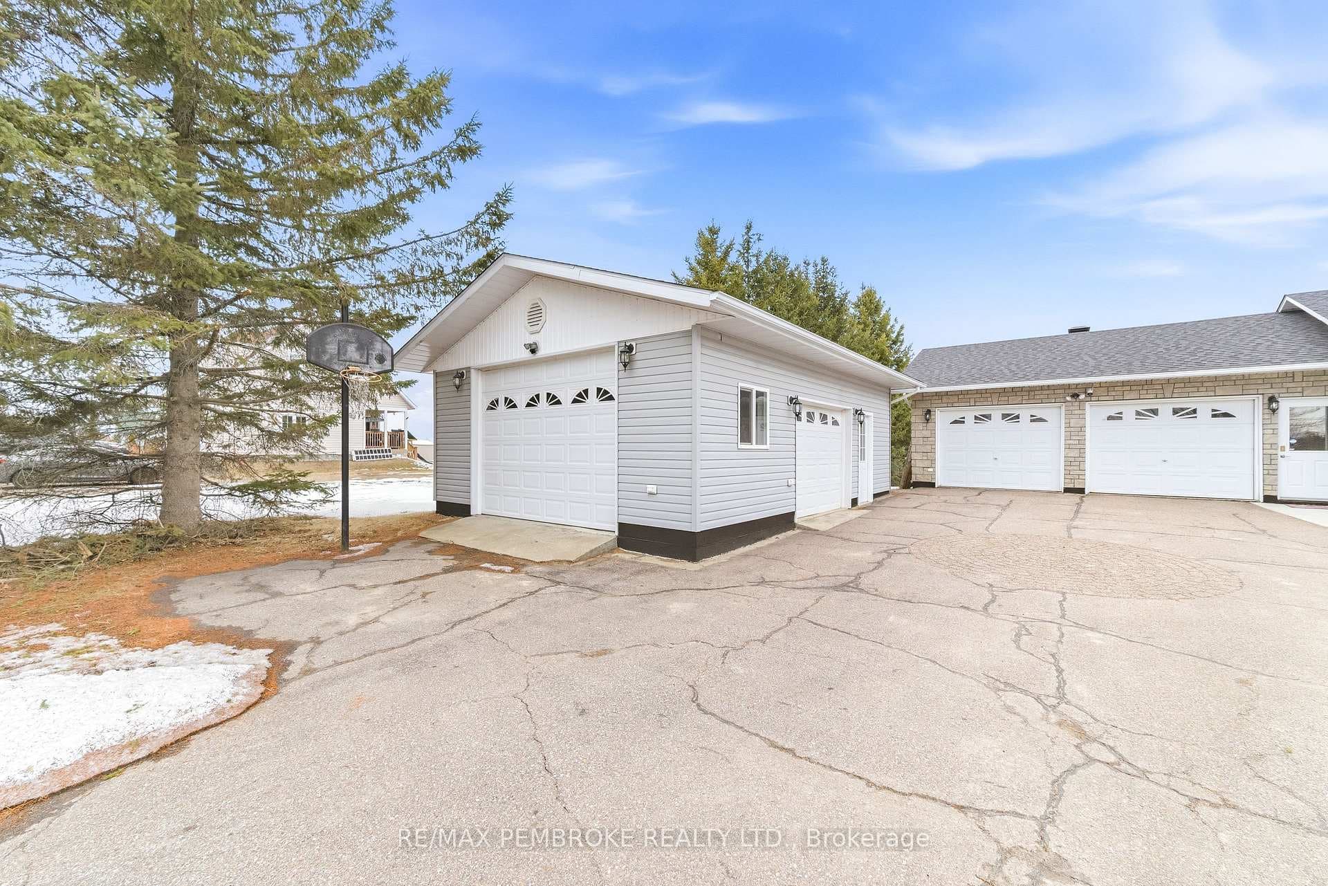 Large detached garage for toys, boat etc