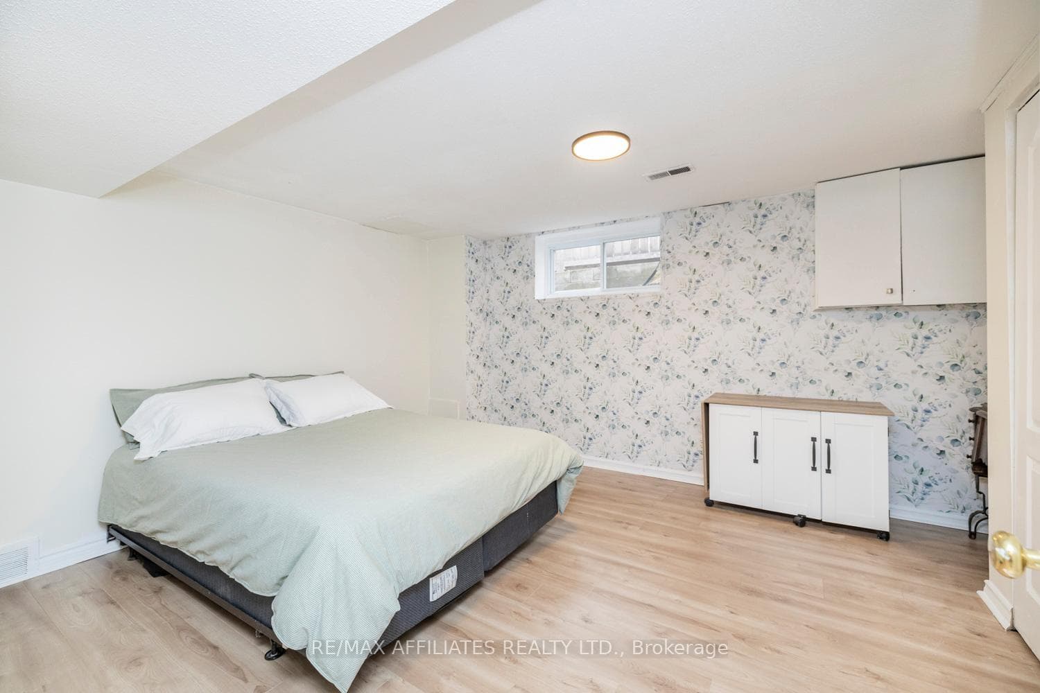 Basement bedroom 2, also well lit and spacious!