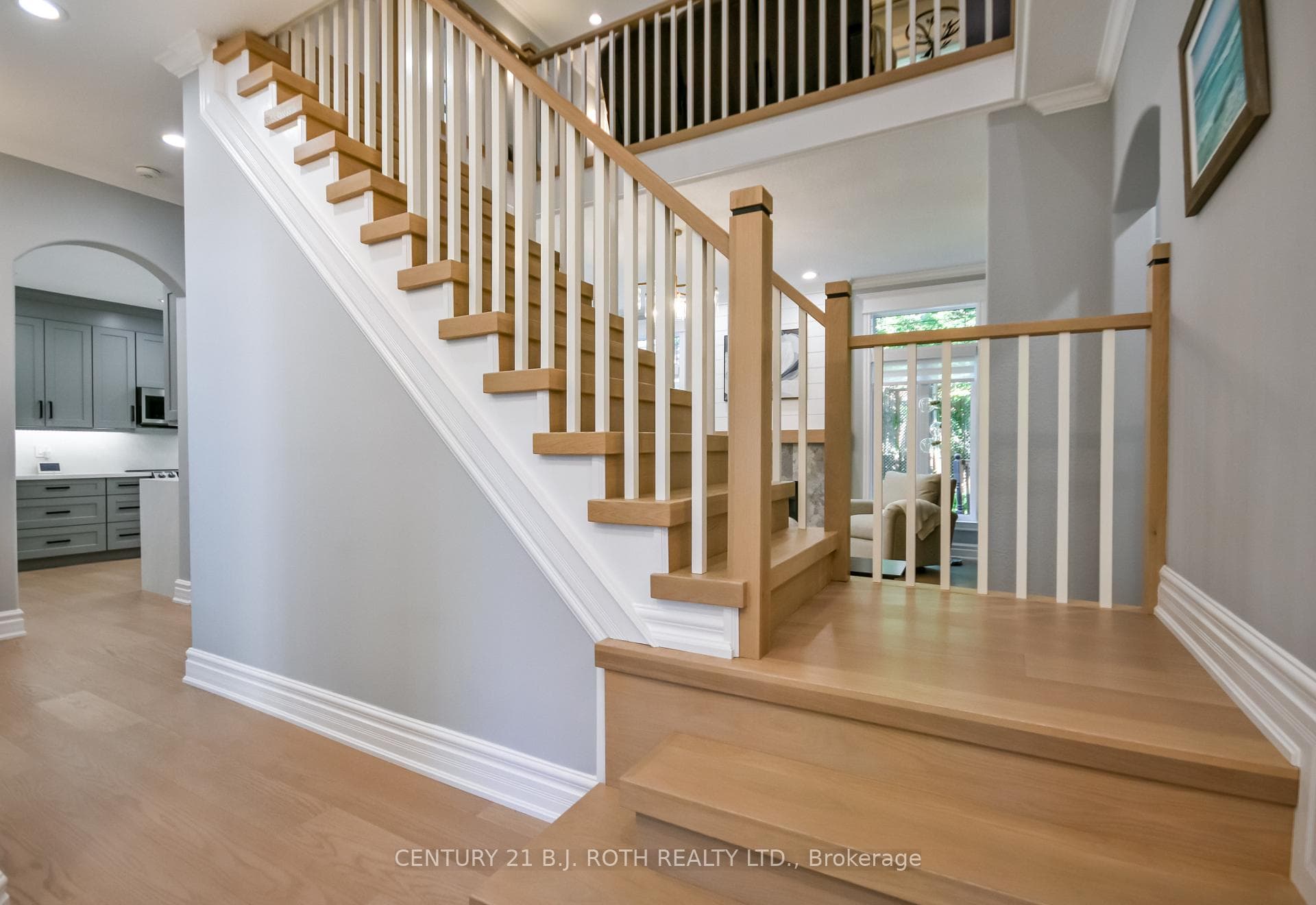 Grand custom staircase to the second floor