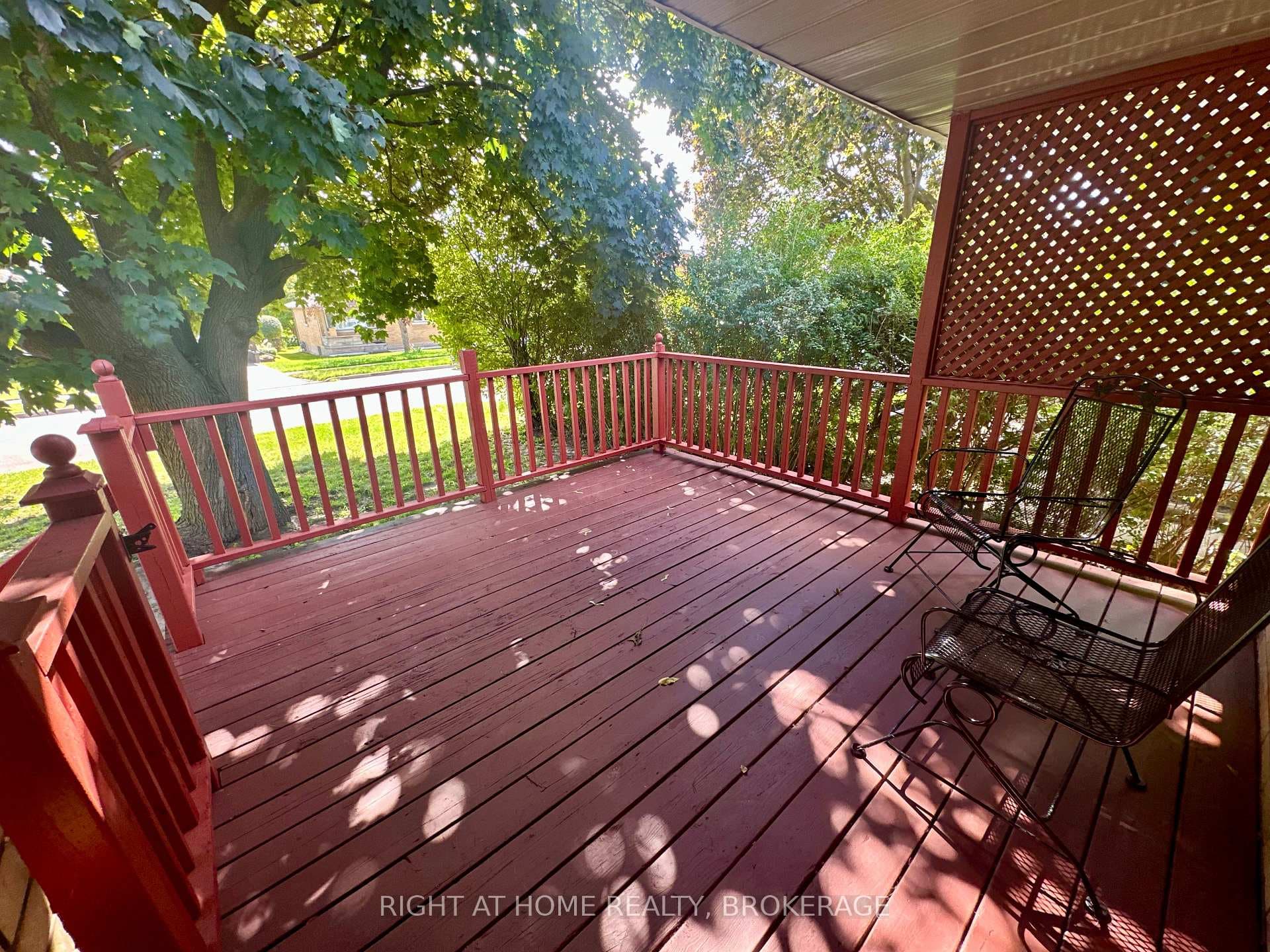 View of wooden terrace off eat-in kitchen