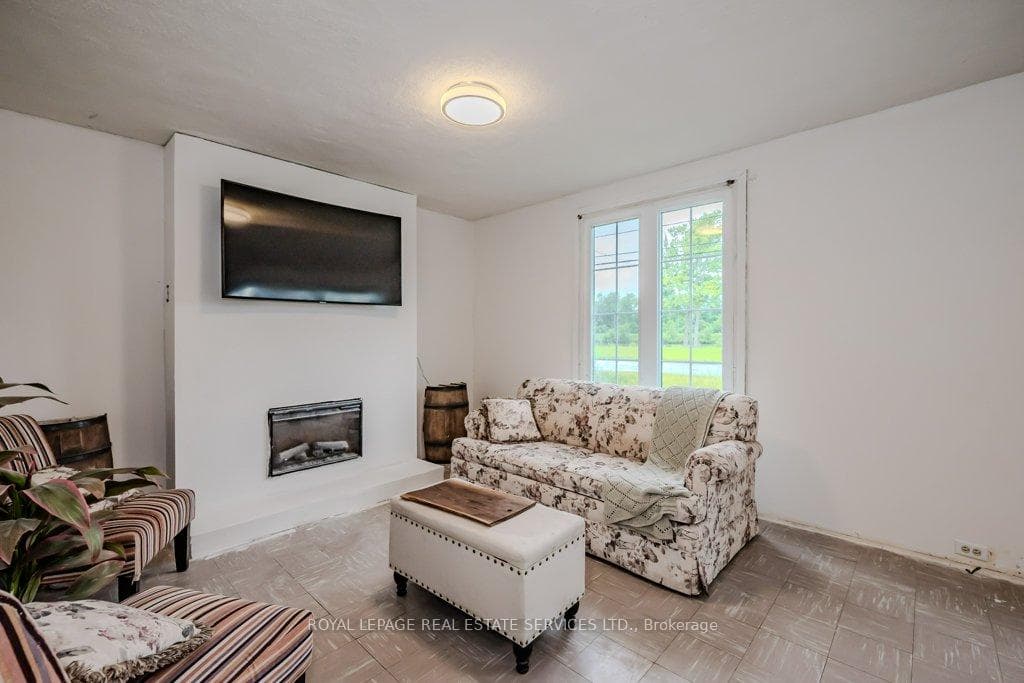 Oversized Living Room with an Electric Fireplace