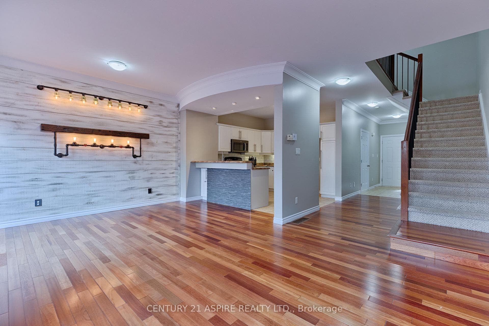 Kitchen counter has an overhang/breakfast bar