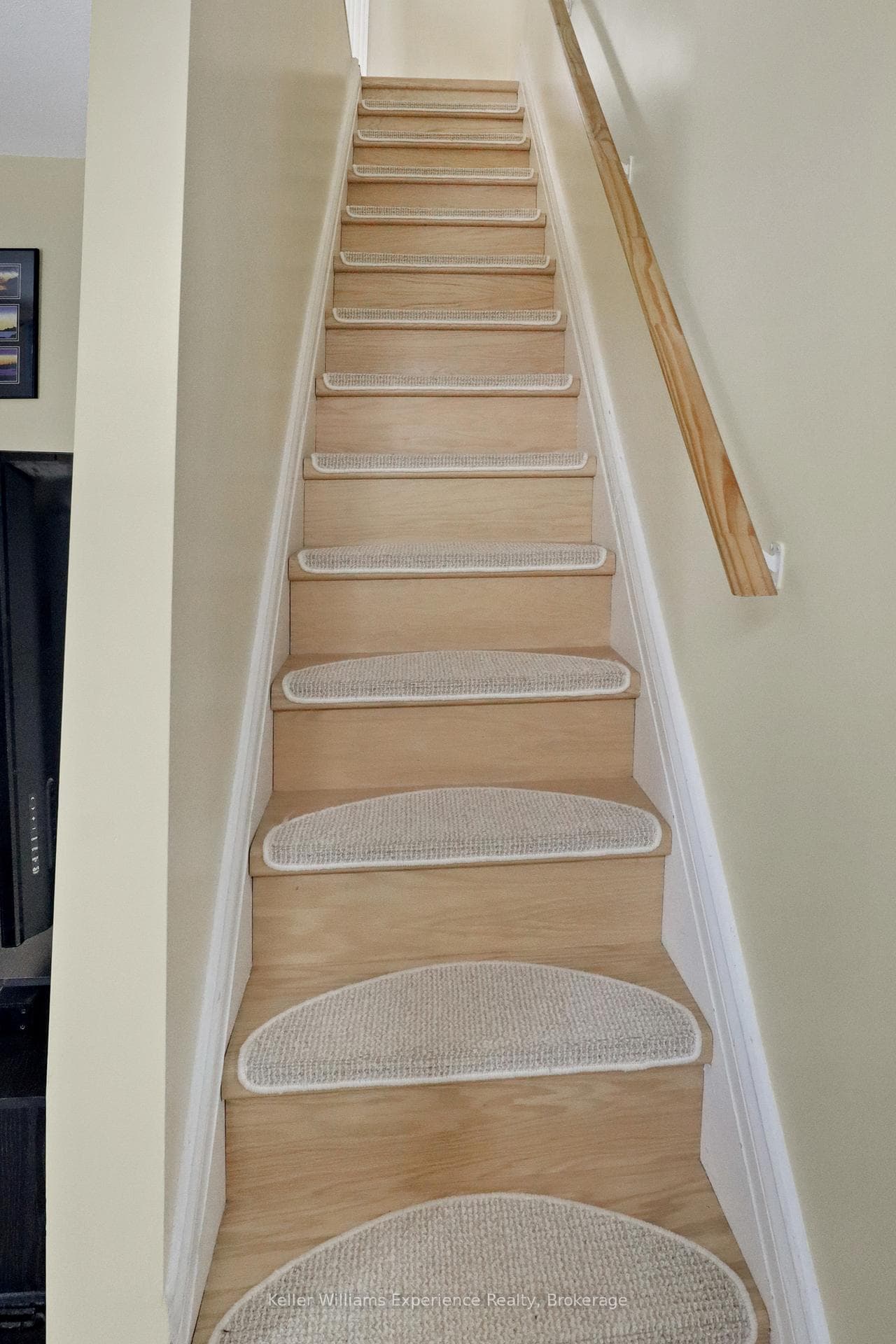 Crisp, Clean Staircase to the Upper Level