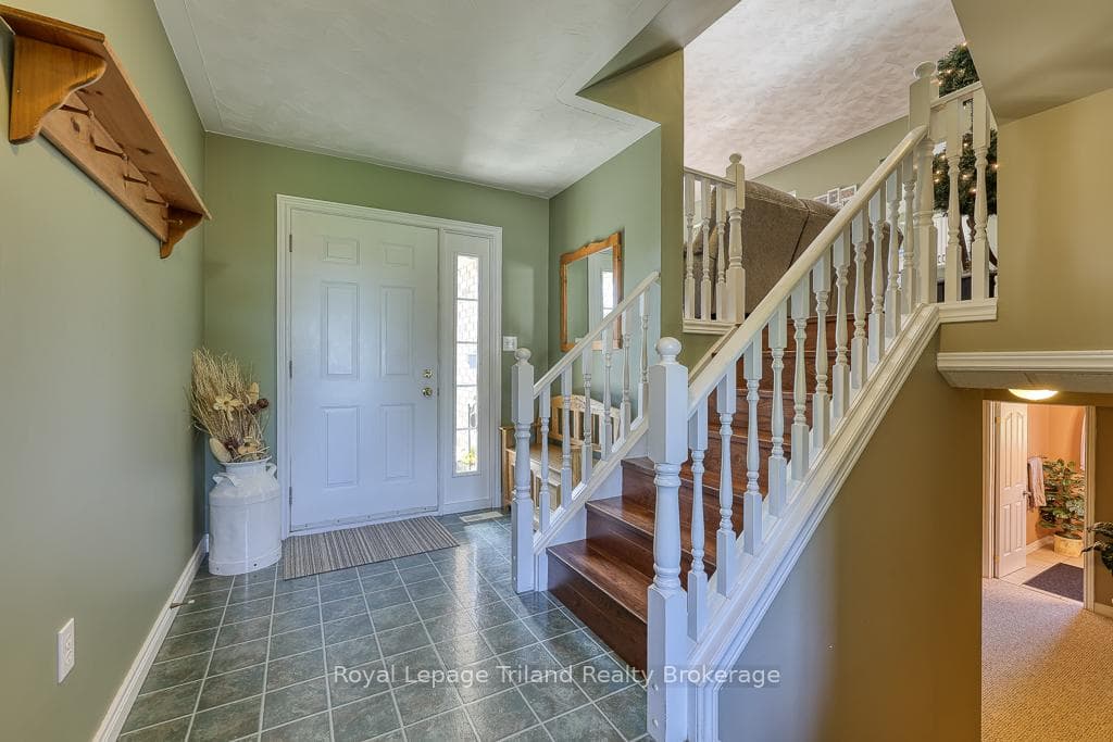 Foyer/Mudroom (access to garage & back yard/deck)