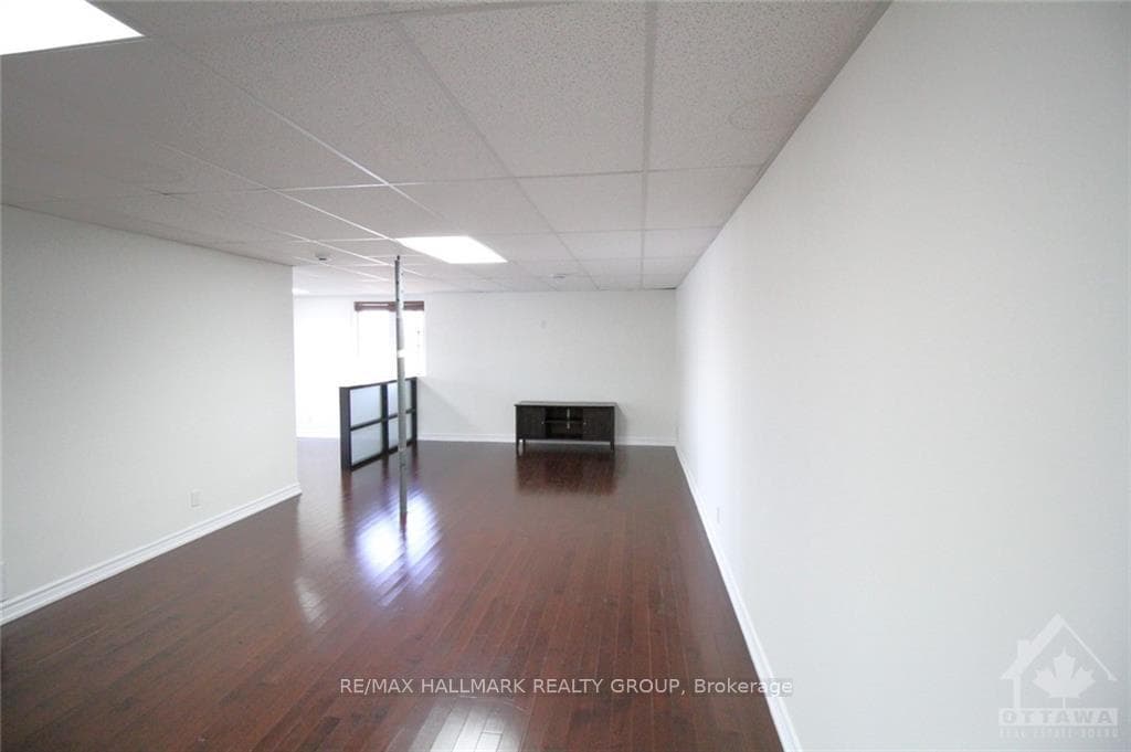 Lower level large rec room with hardwood