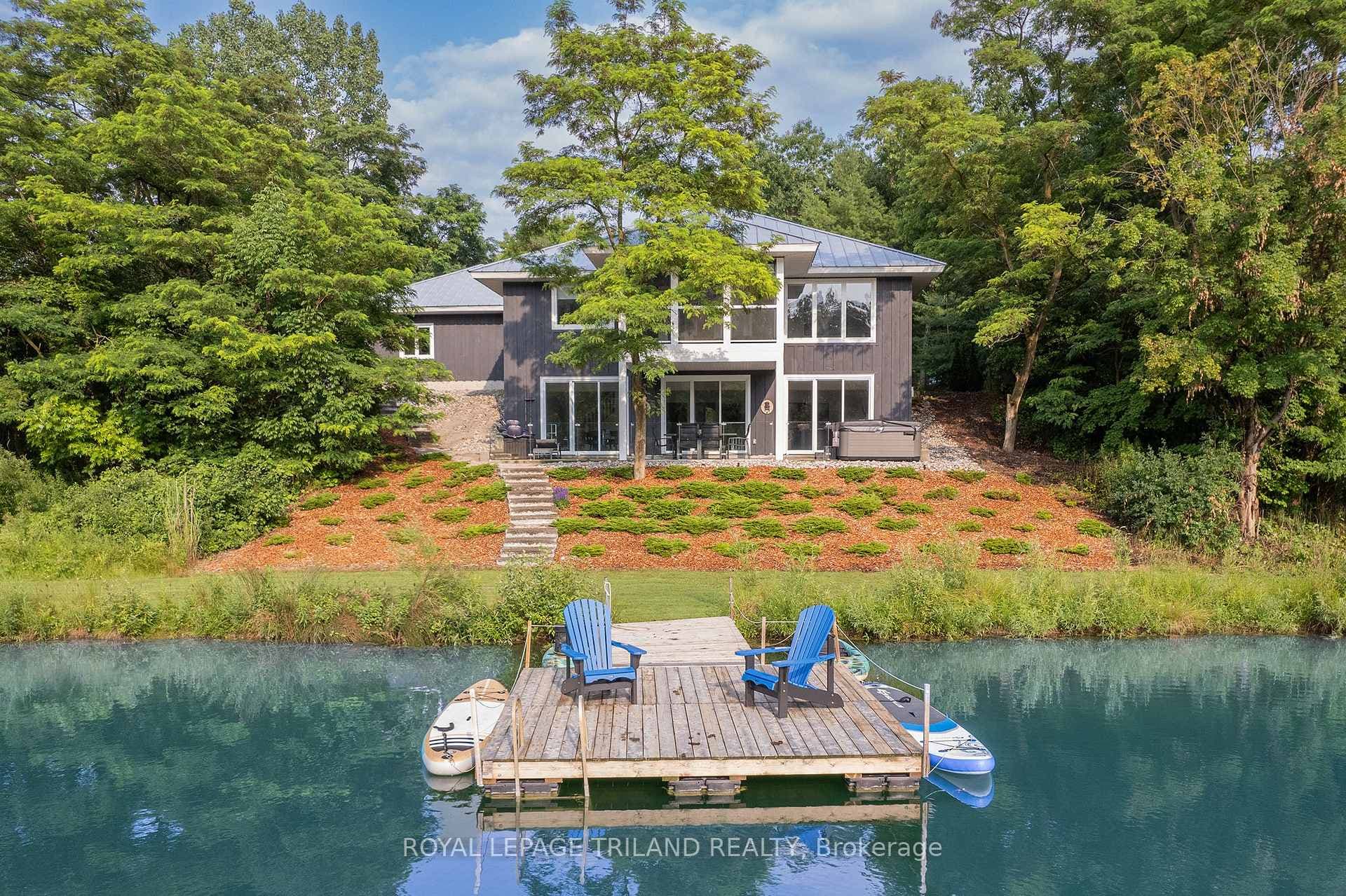 Beautiful lakefront setting w/ private dock