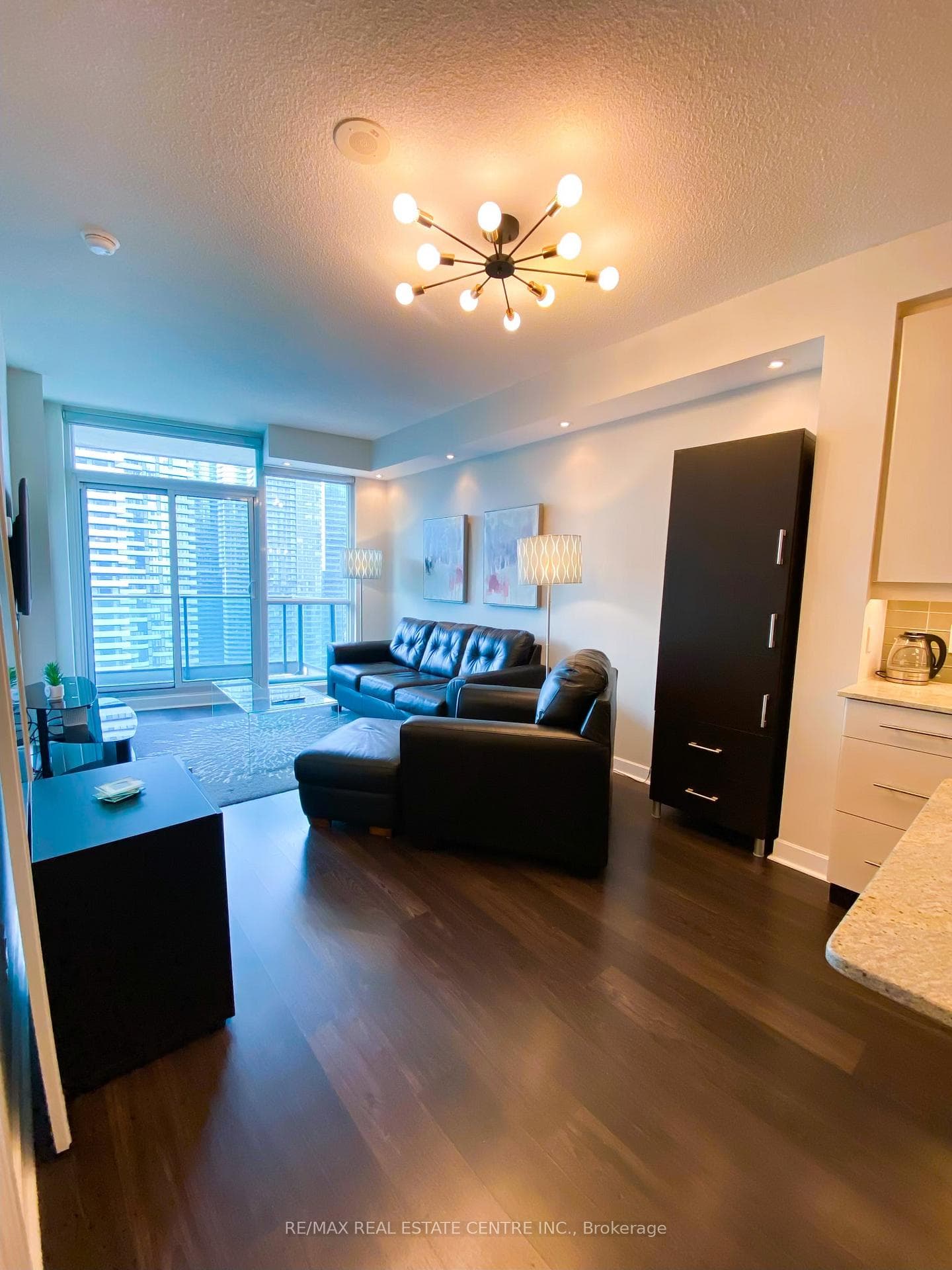 Living Area with Walk/out to Balacony