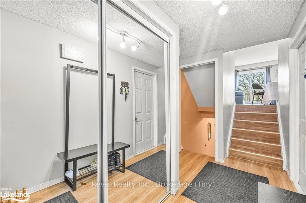 Spacious foyer with closet
