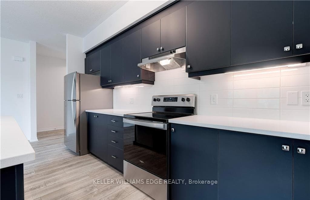 Kitchen w/ Stainless Steel Appliances